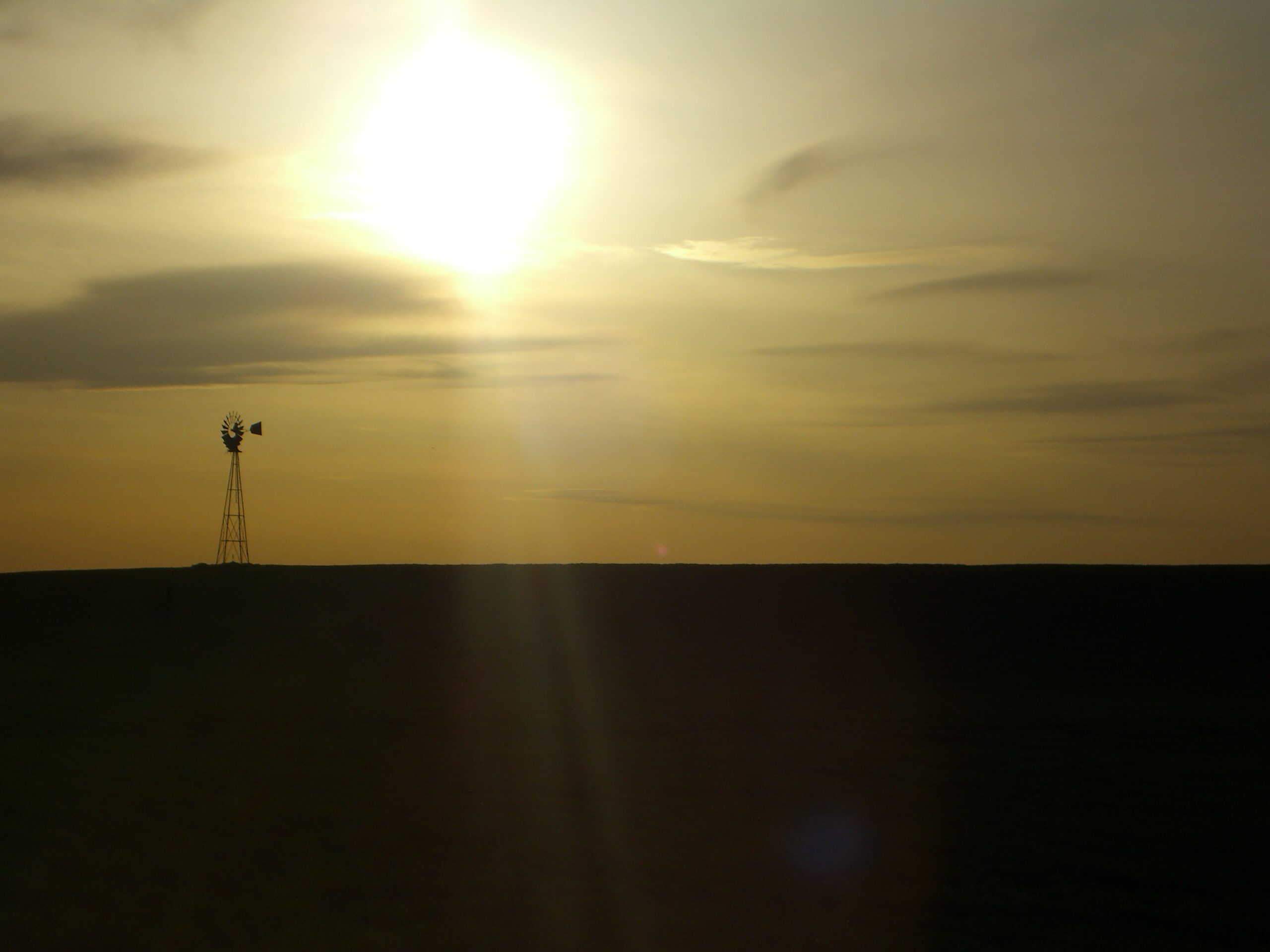 A windmill in the Yakima Valley at sunset