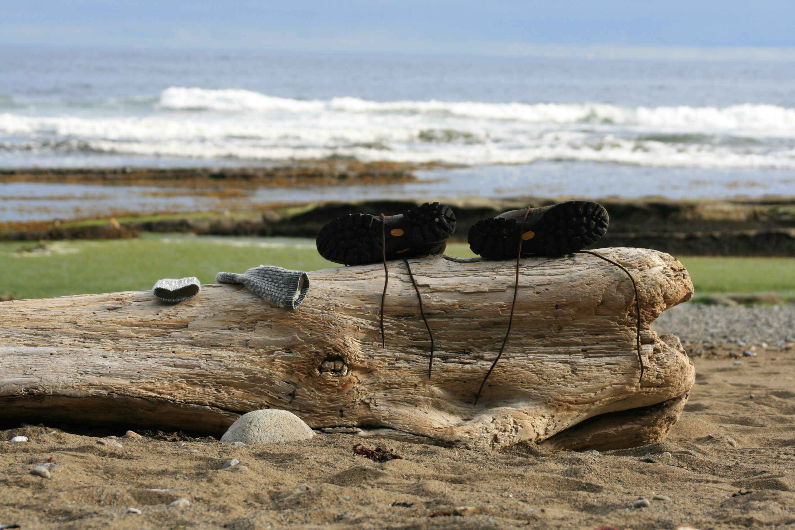 Socks and boots dry in the sun near the West Coast Trail's Michigan Creek (photo by Brian Leukart)