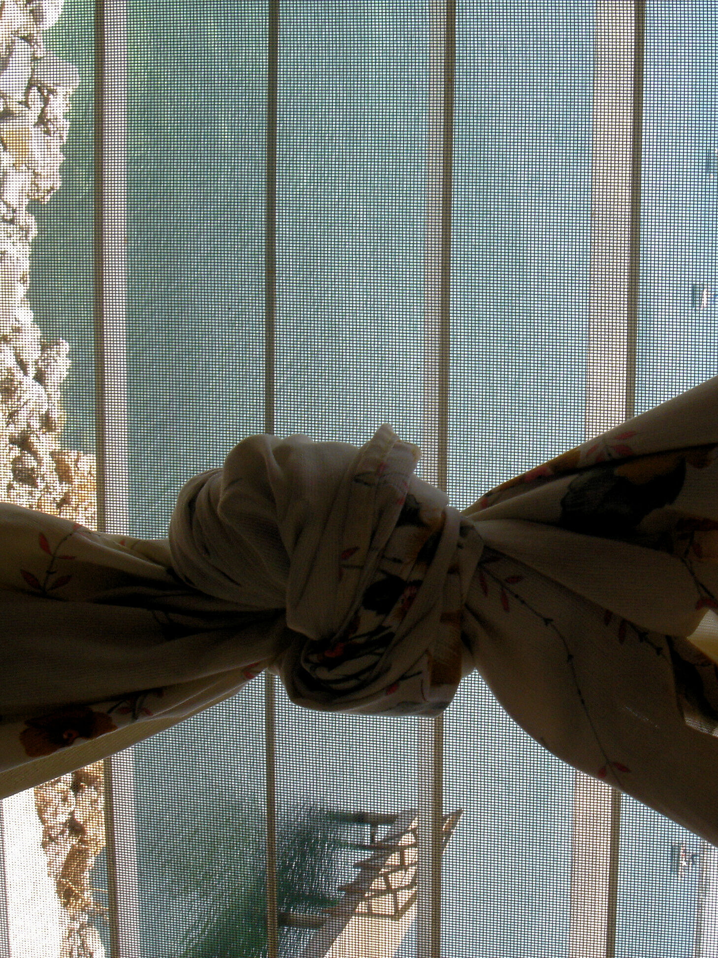 Knotted curtains in a room at Rubi's in Utila, Honduras.