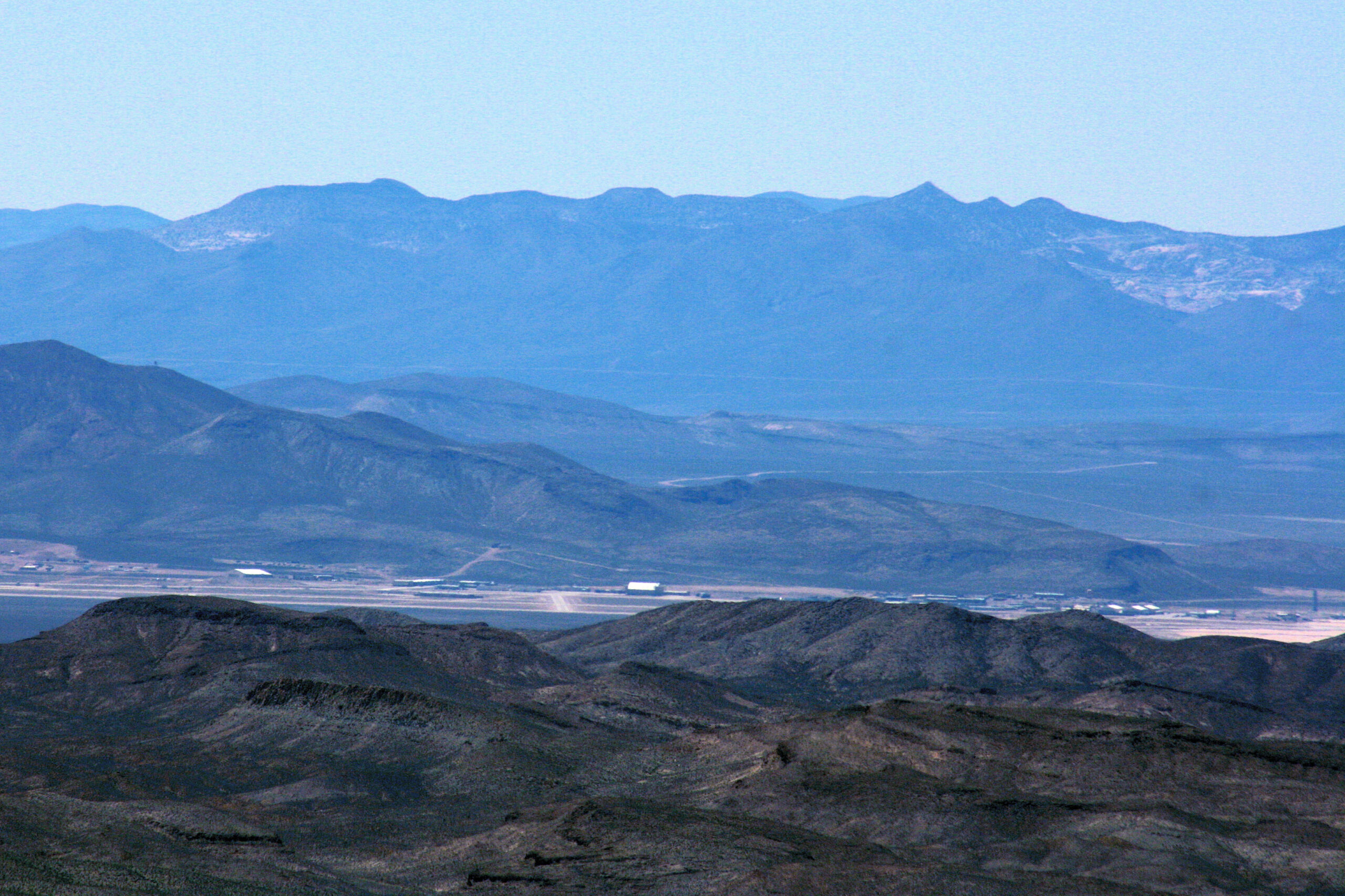 Buildings comprising the Area 51 military installation can be seen clearly with a telephoto lens from nearby Tikaboo Peak.