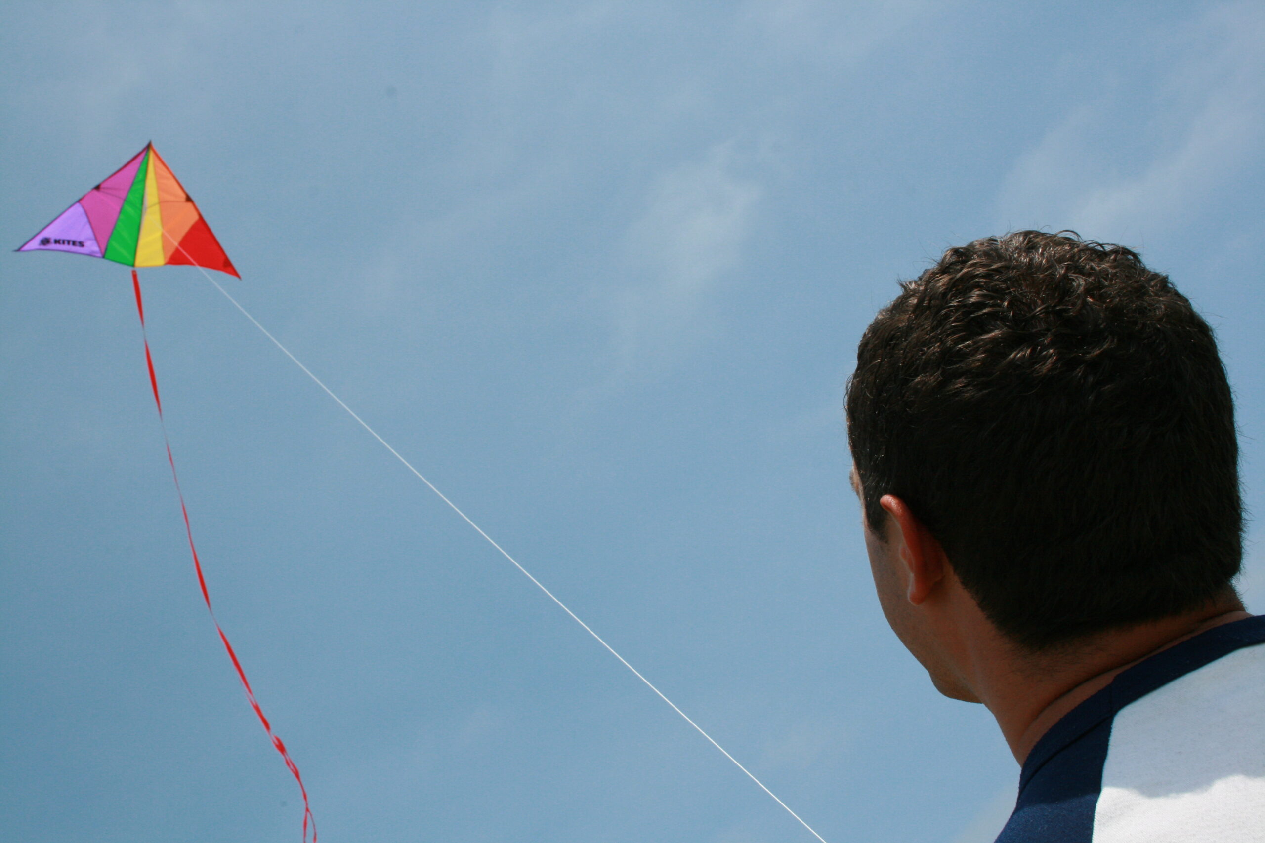 Hank flies a kite near the Korean Bell of Friendship.