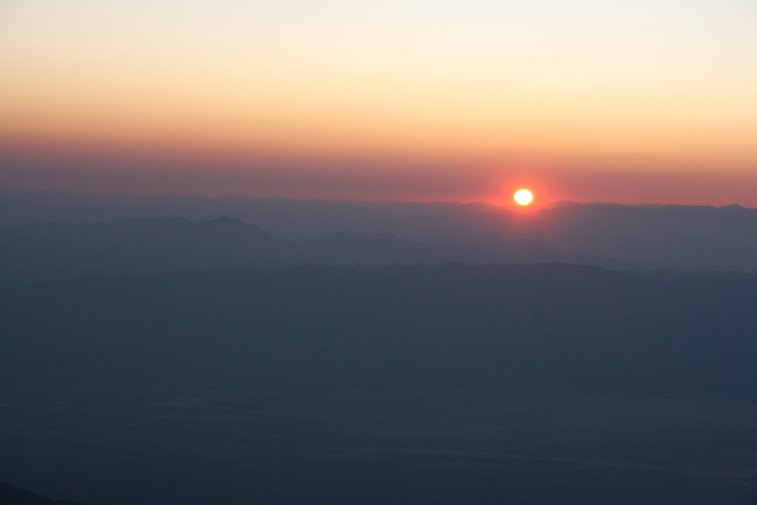The rising desert sun seen from Death Valley's Telescope Peak