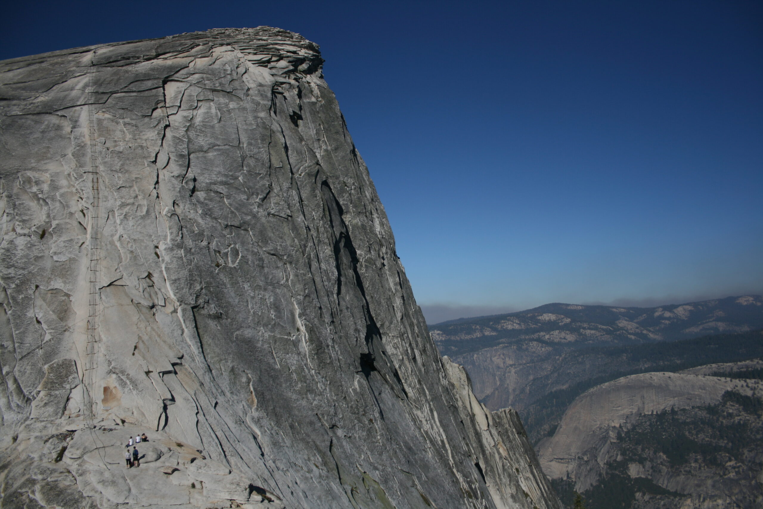 People looking at Half Dome cables
