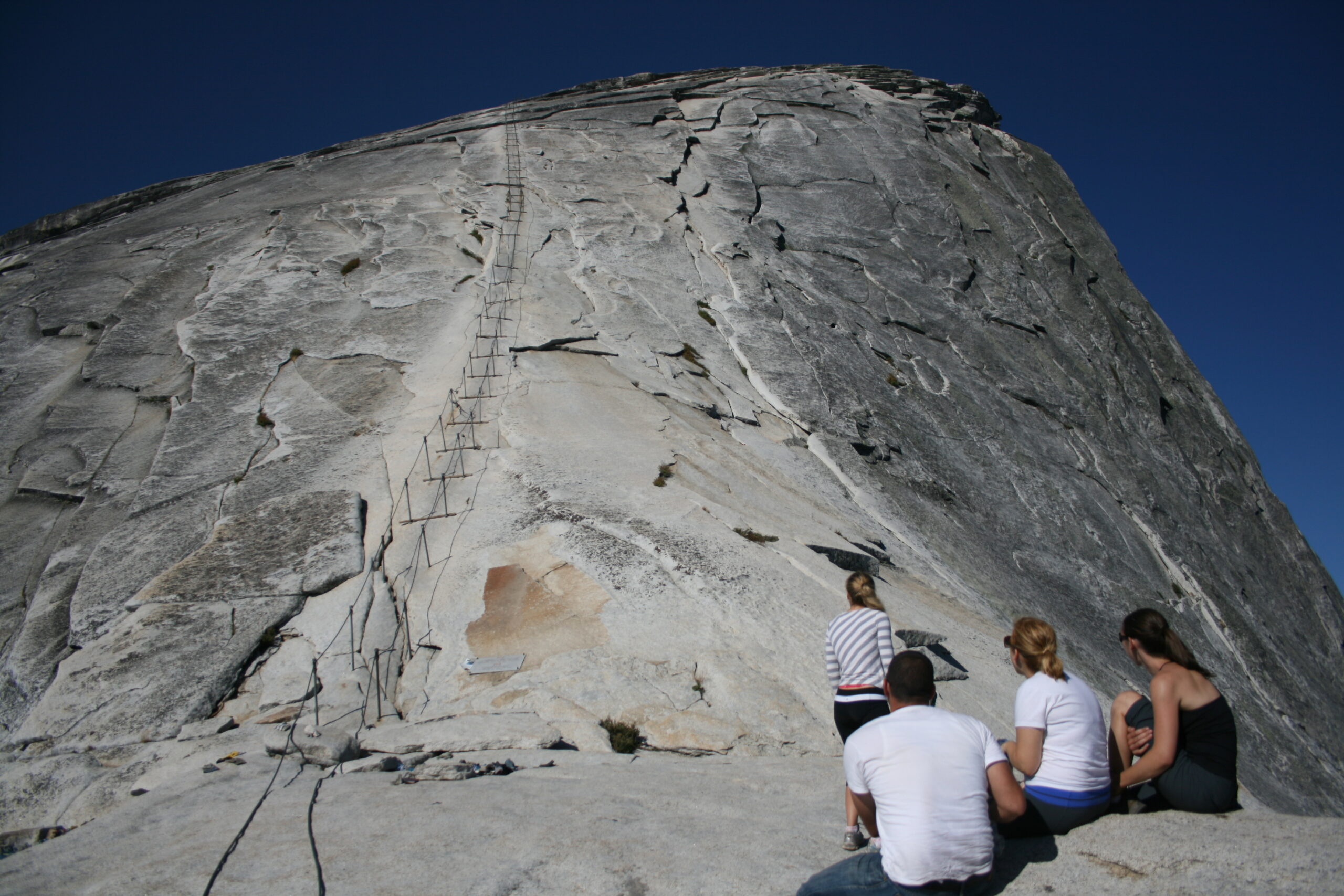 People looking at Half Dome cables