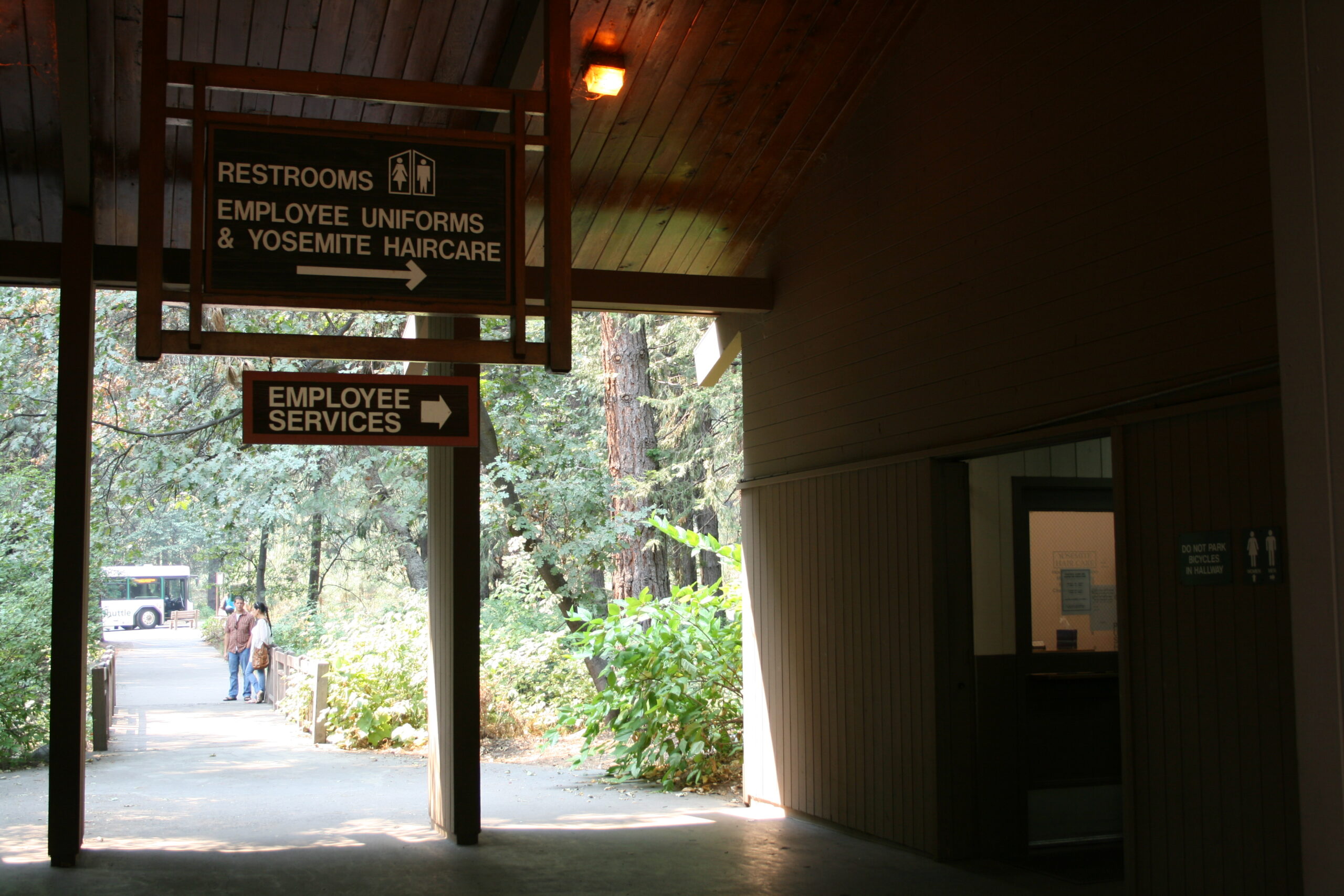 Employee Uniforms and Yosemite Haircare sign