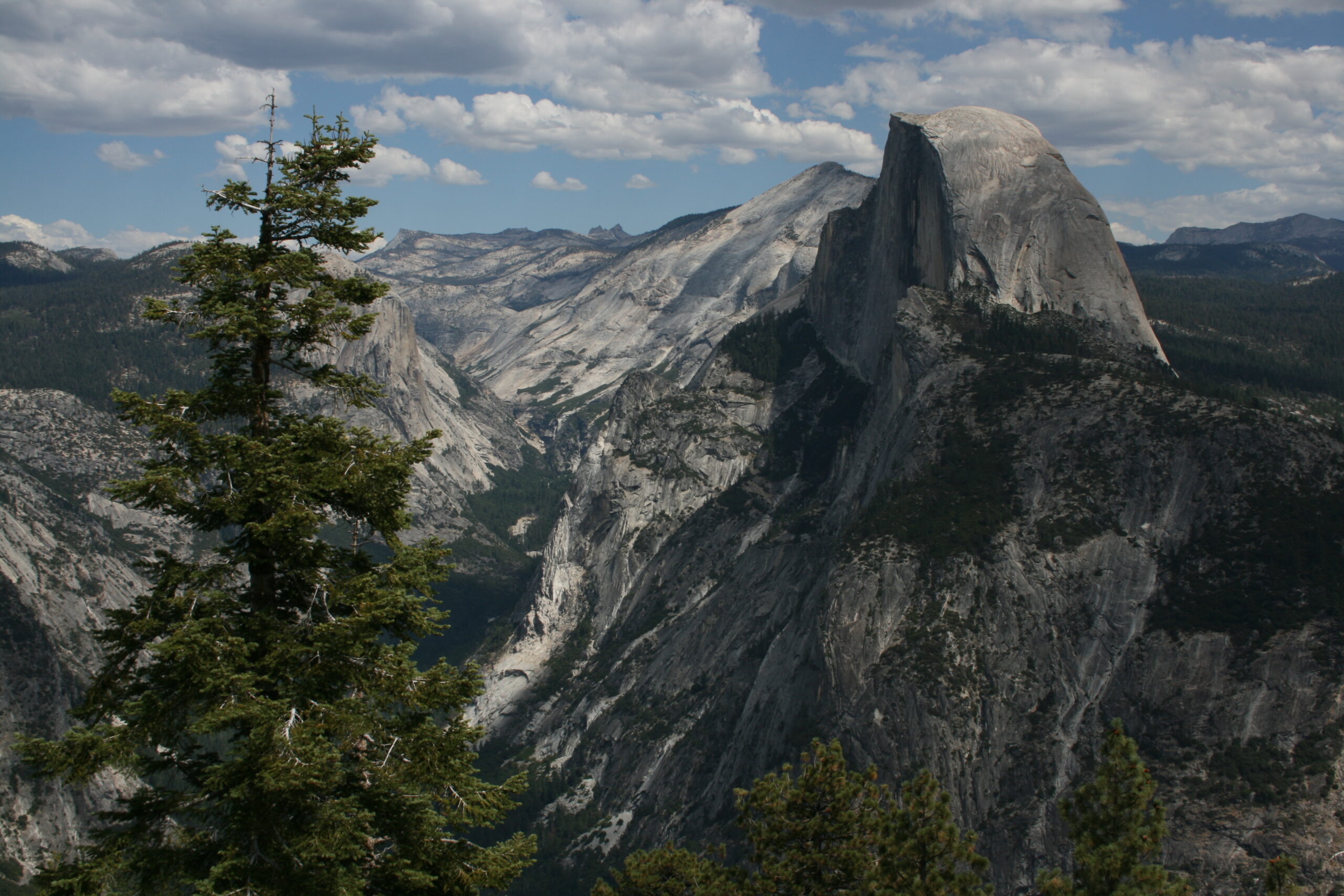 A view of Half Dome in the Yosemite Valley, seen from Glacier Point