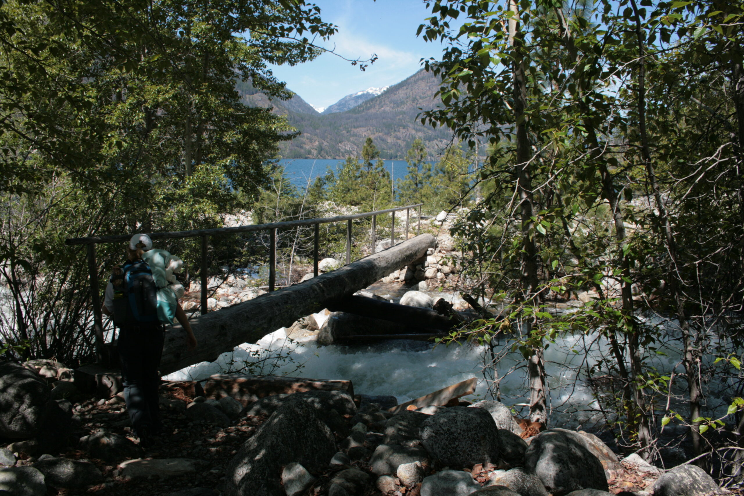 A hiker readies to cross Prince Creek near Lake Chelan.