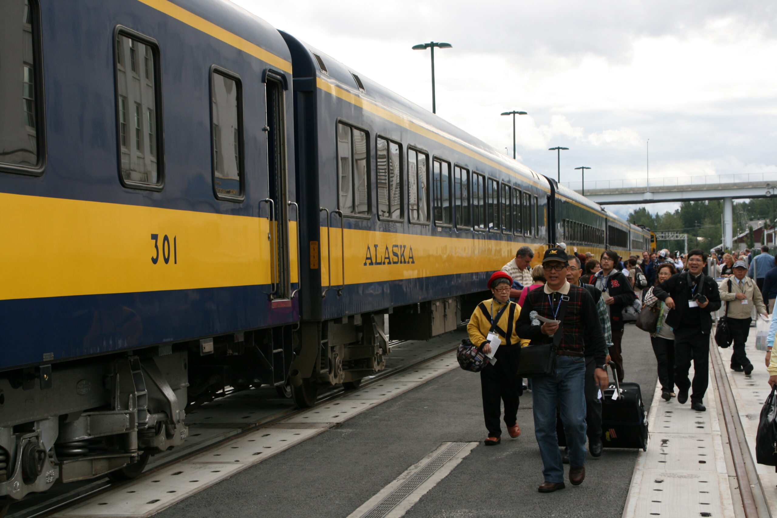 Japanese tourists prepare to board the Alaska Railroad in Anchorage, Alaska.