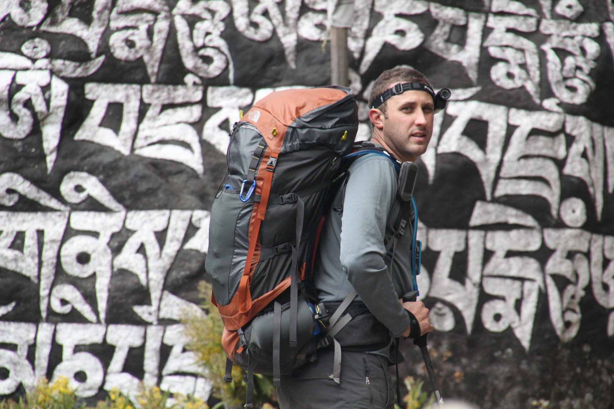 Hank stops in front of a mani stone while wearing a Contour HD head-mounted camera.