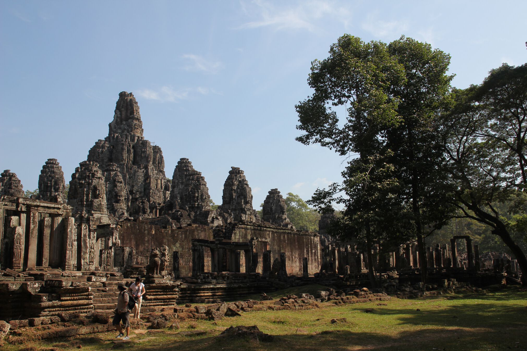 Hundreds of stone faces watch over visitors to the Bayon temple in Angkor Thom.