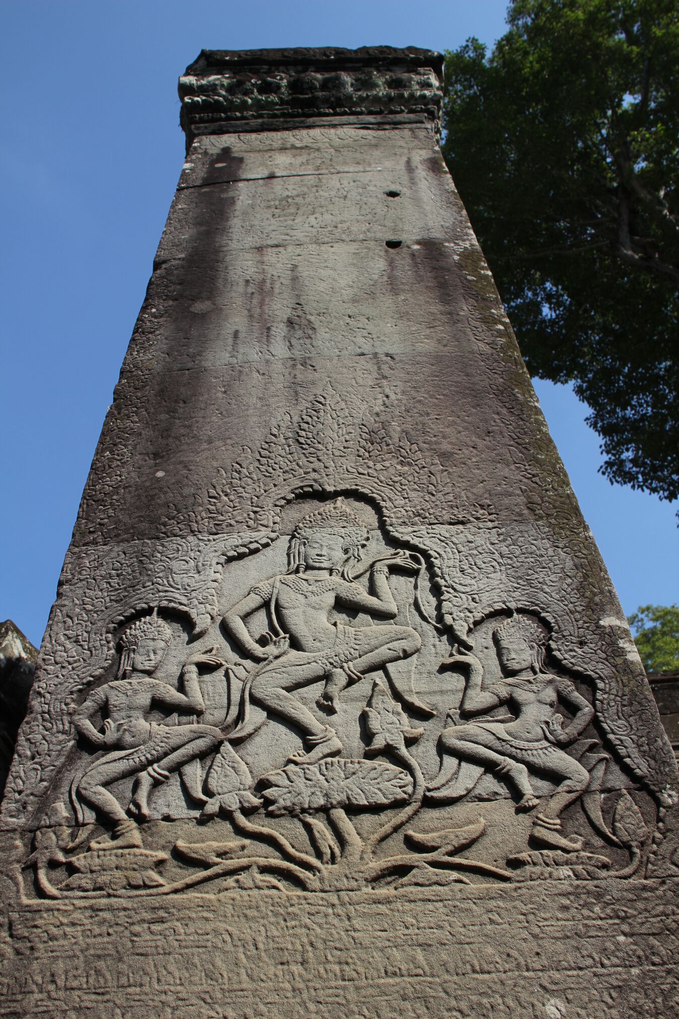 Apsara dancers adorn the walls of Bayon in Angkor Thom.