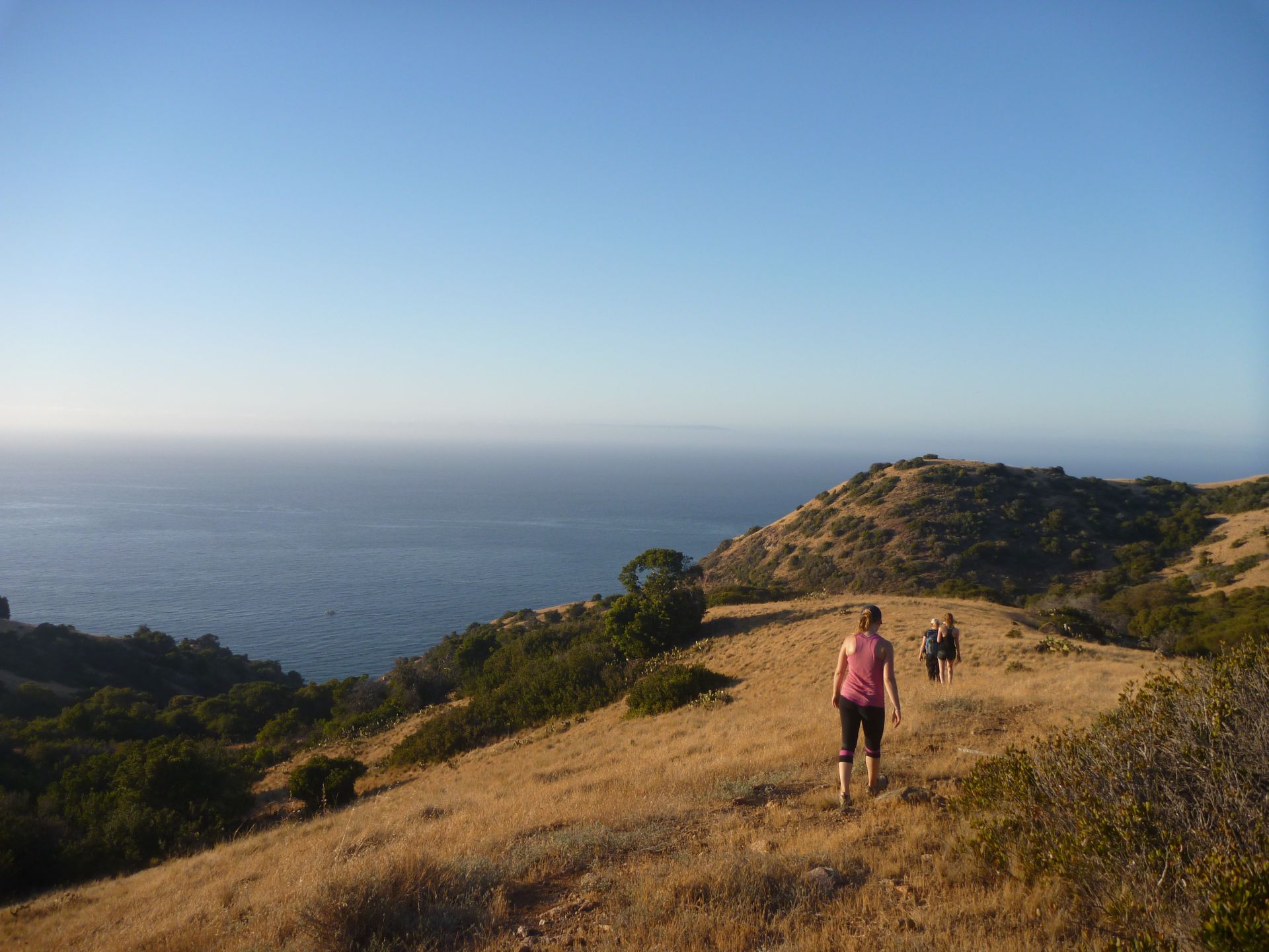 Hikers walk above the Lava Wall camp site below the Catalina Island airport.