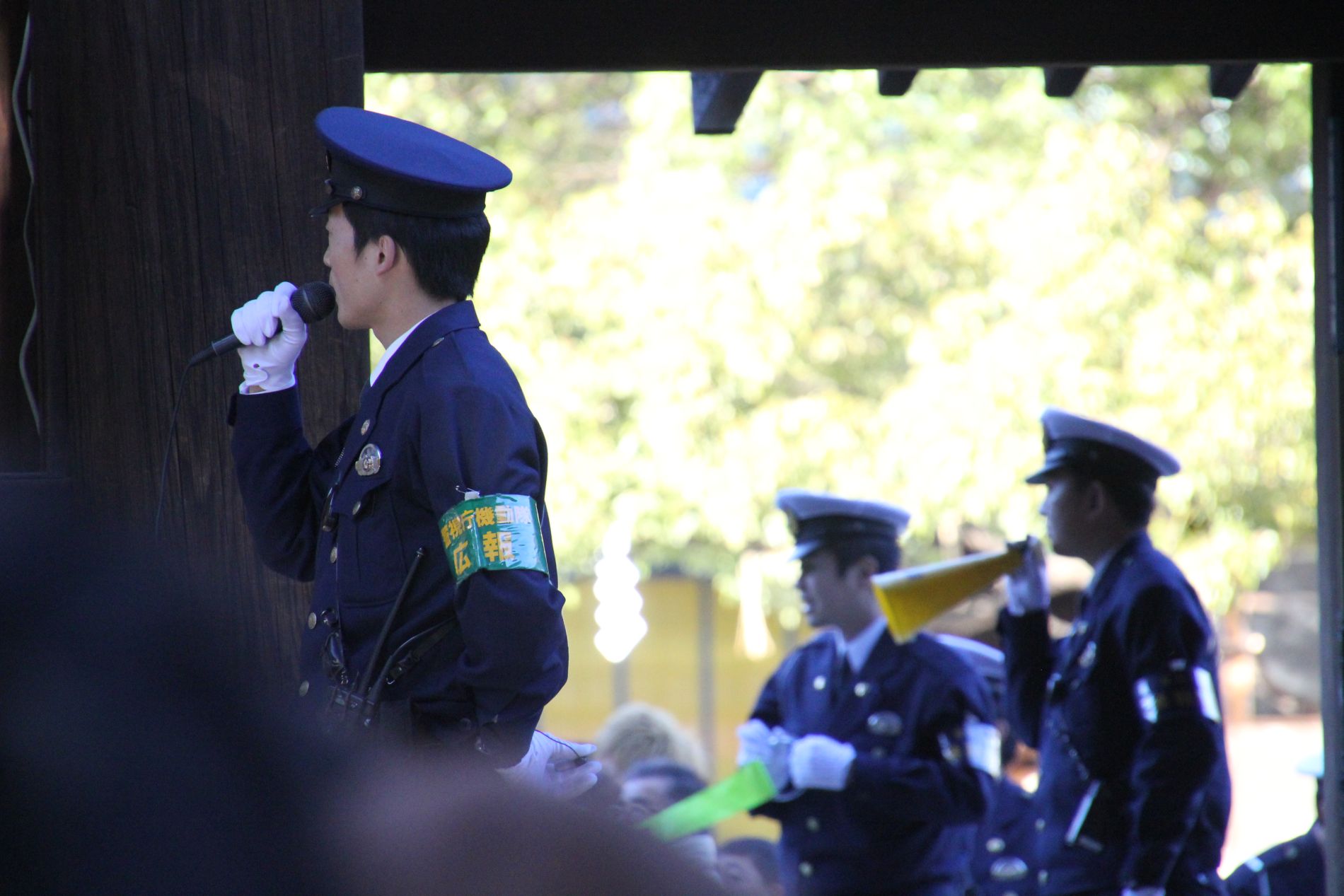 Japanese police manage the Meiji Jingu Shrine's many visitors.