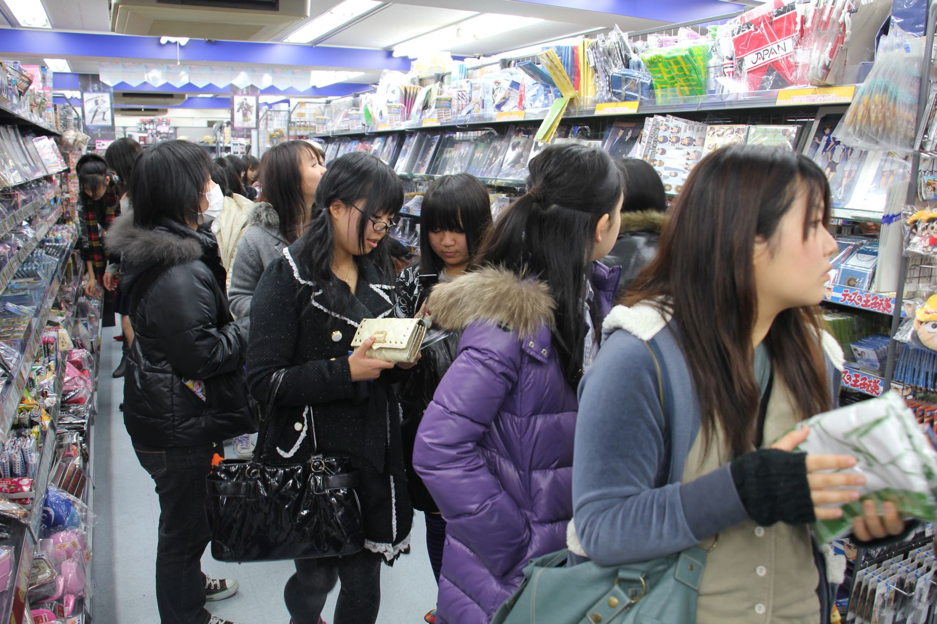Japanese girls buy manga on Otome Road in Tokyo, Japan.