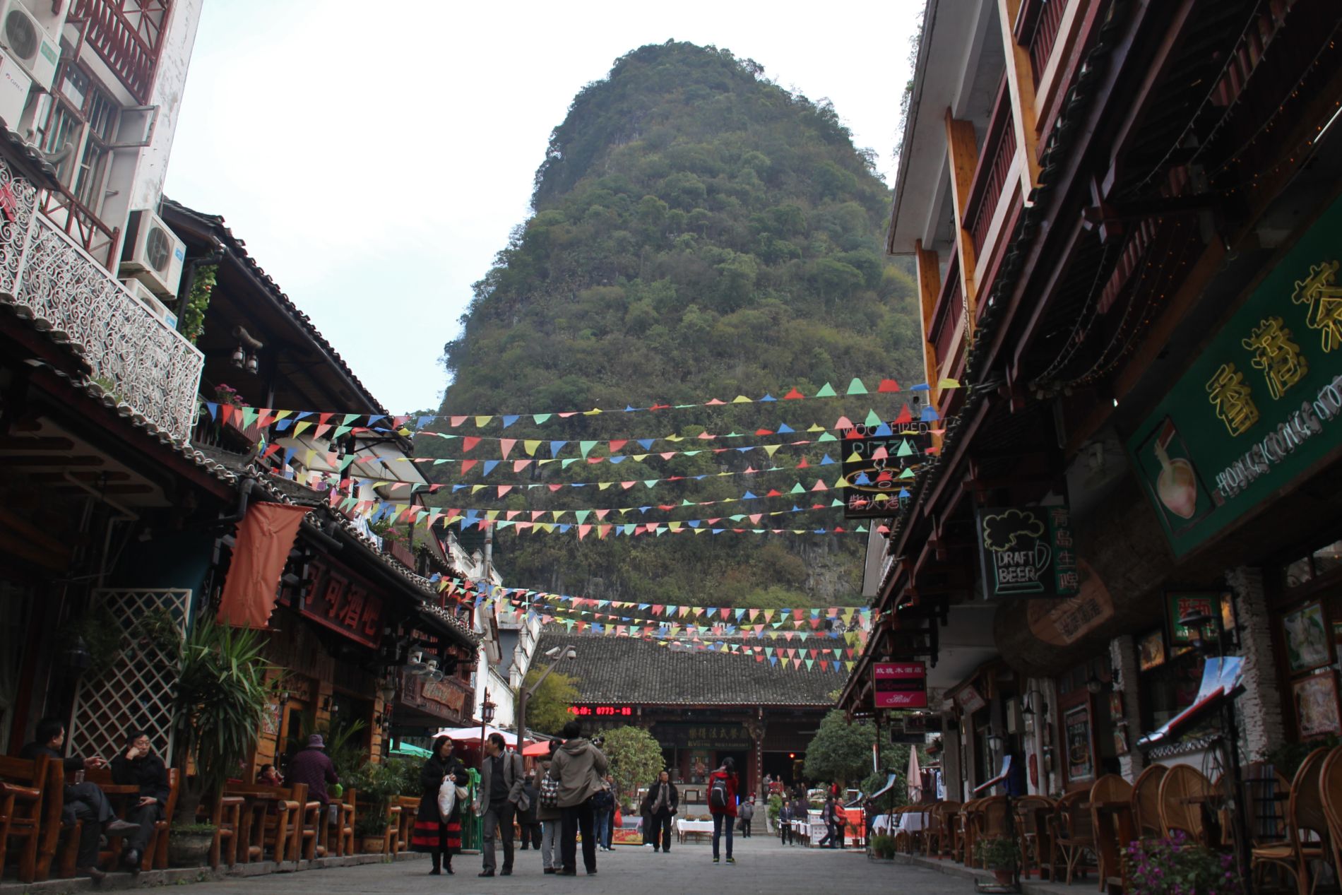 Karsts serve as backdrops to the streets of Yángshuò.