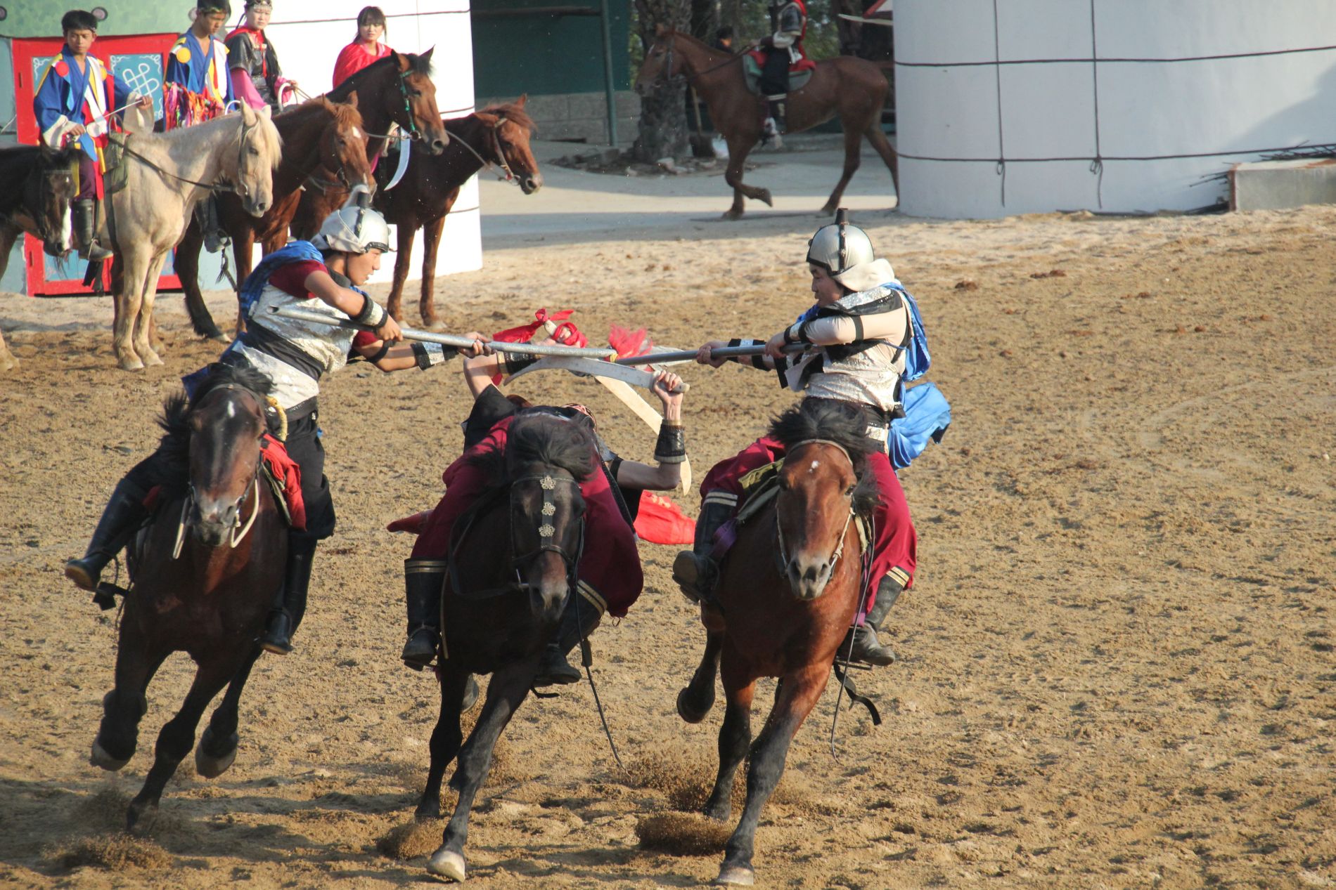 Actors perform a reenactment of a Genghis Khan horseback battle at Splendid China in Shenzhen.