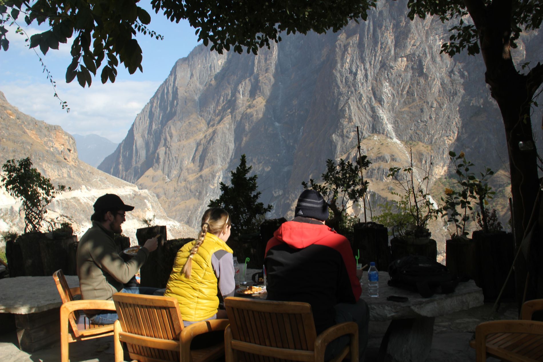 Hikers admire the view from the outdoor restaurant at Sean's Guest House in Walnut Garden, China.