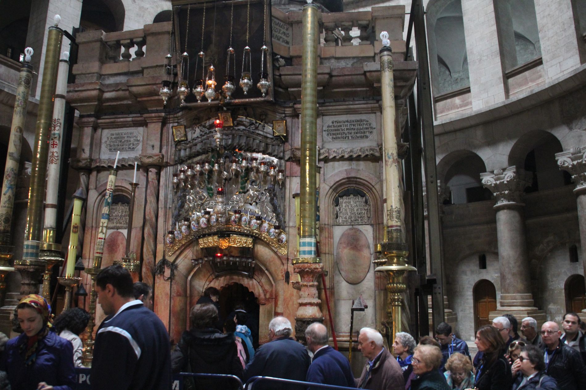 Tourists wait in the Church of the Holy Sepulchre to enter the Edicule, the alleged Tomb of Jesus.