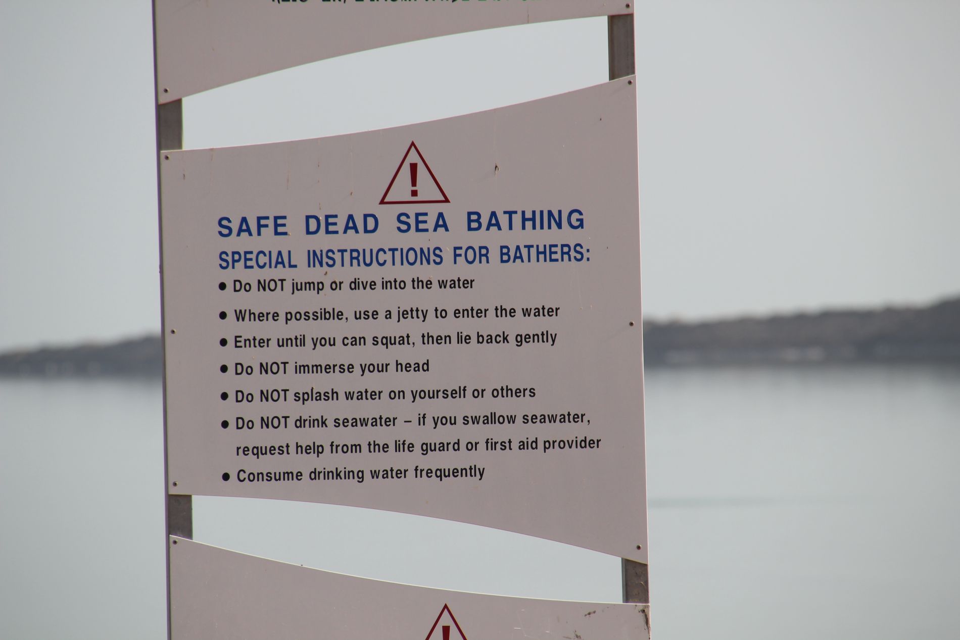 A sign near the Dead Sea warns swimmers of the dangers of the water's high salt content.