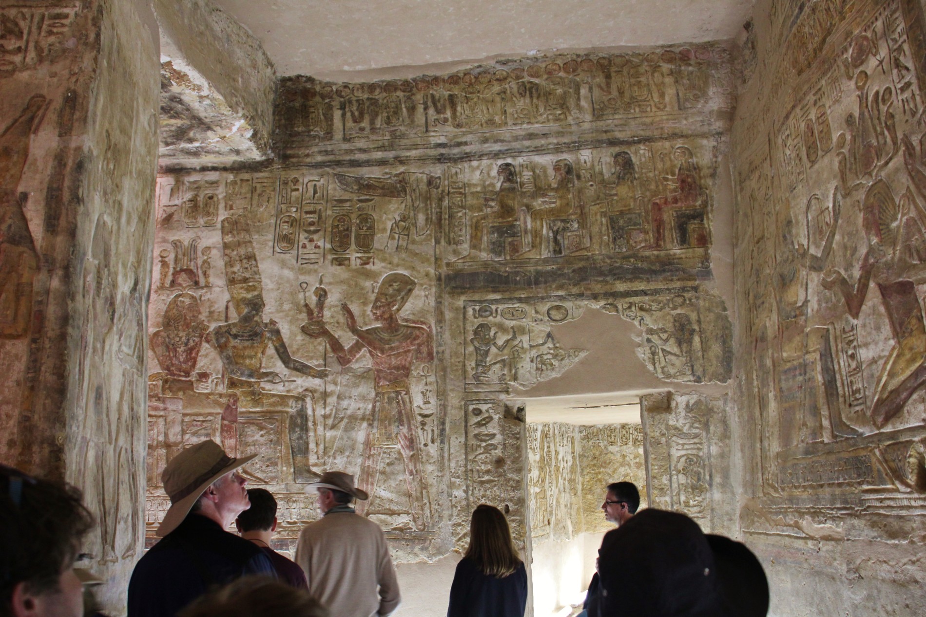 Tourists look at carvings in the Temple of Derr in Lower Nubia, Egypt.