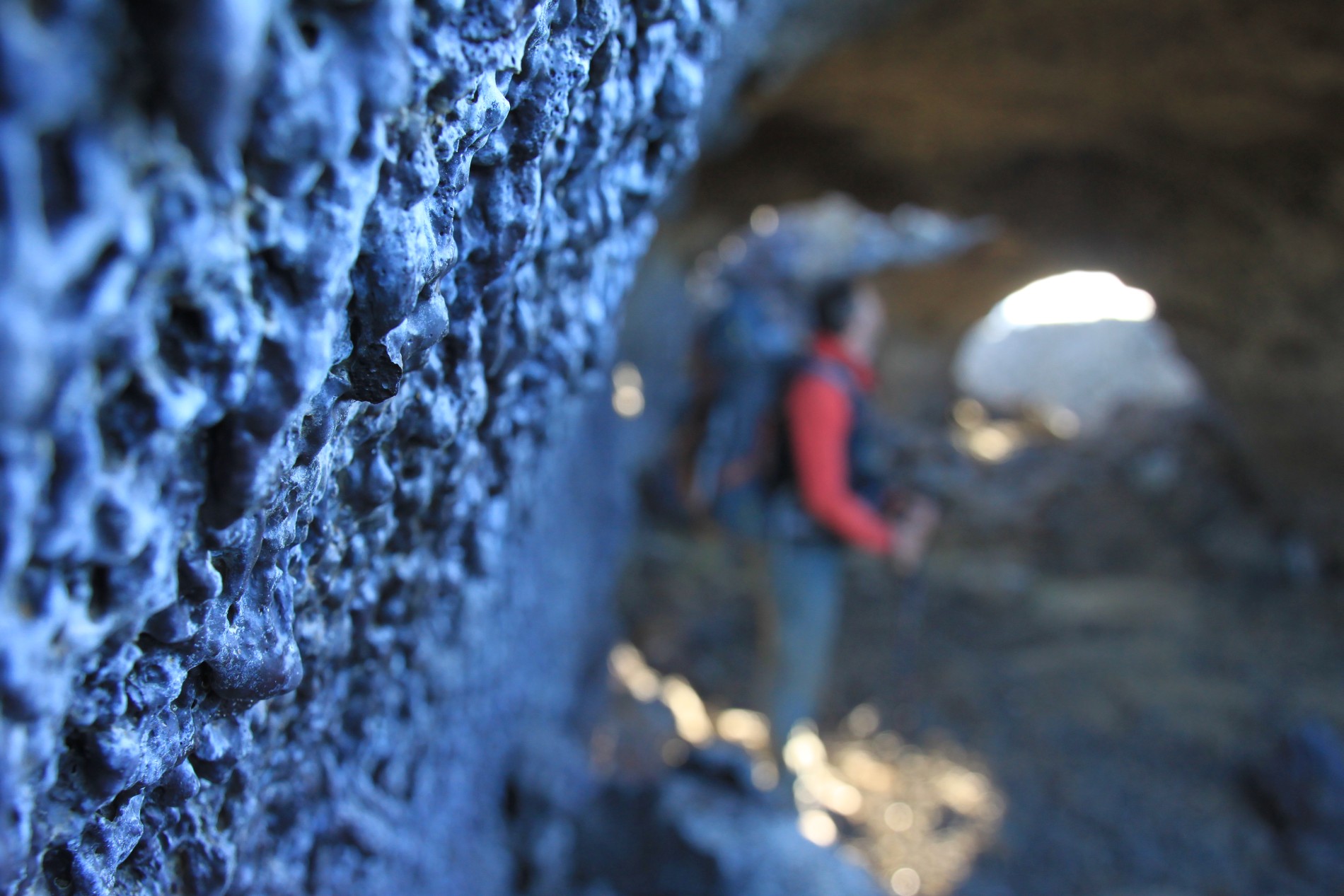 Hank investigates a lava tube near Krafla.