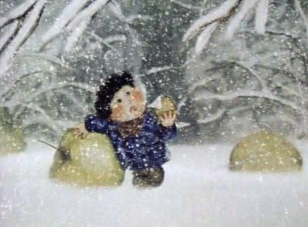 In Tale of Tales, a boy eats an apple in a snowstorm while standing near two other, enormous apples.