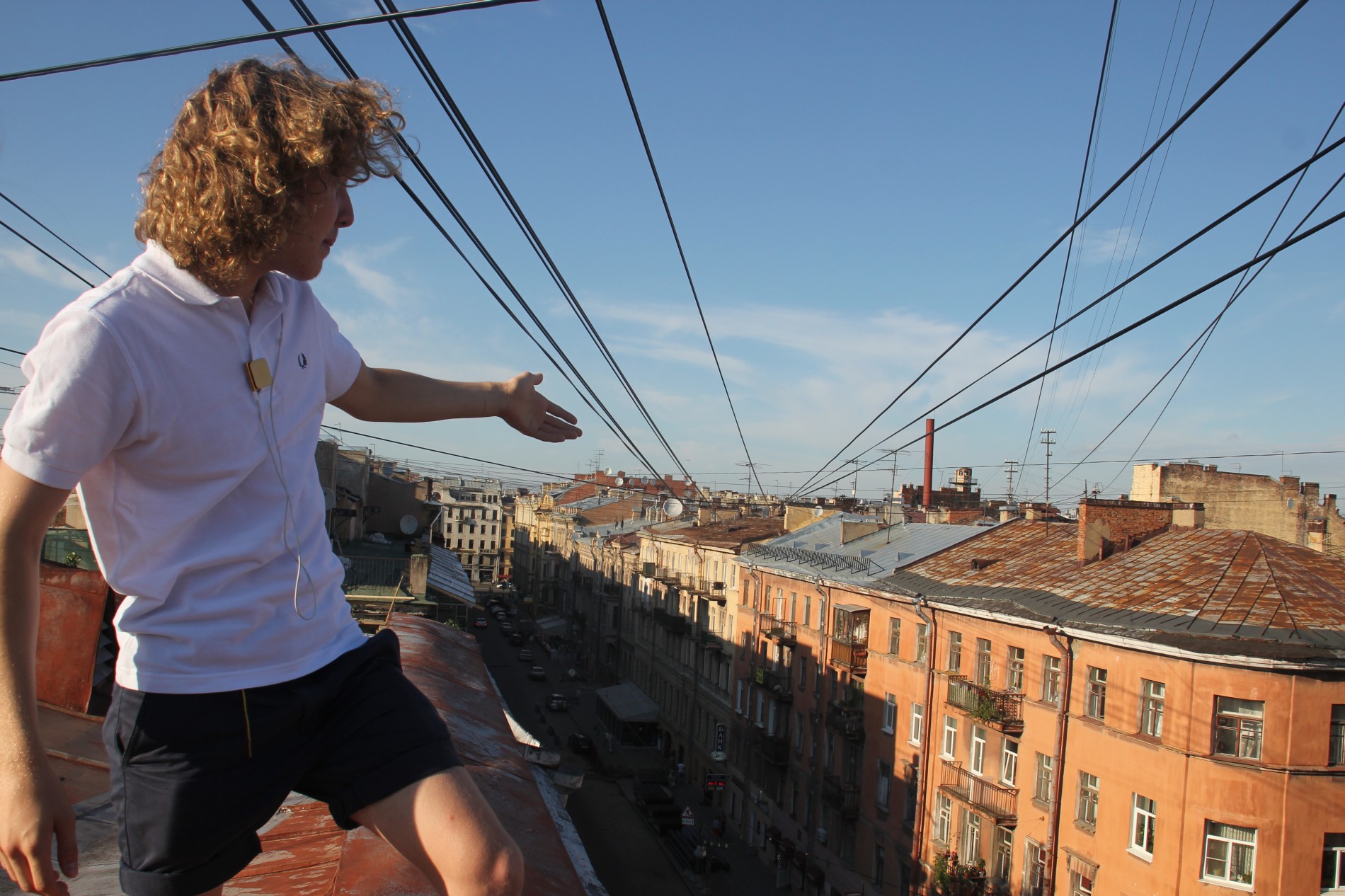 Tour guide Seva describes the view from a rooftop in St. Petersburg, Russia.