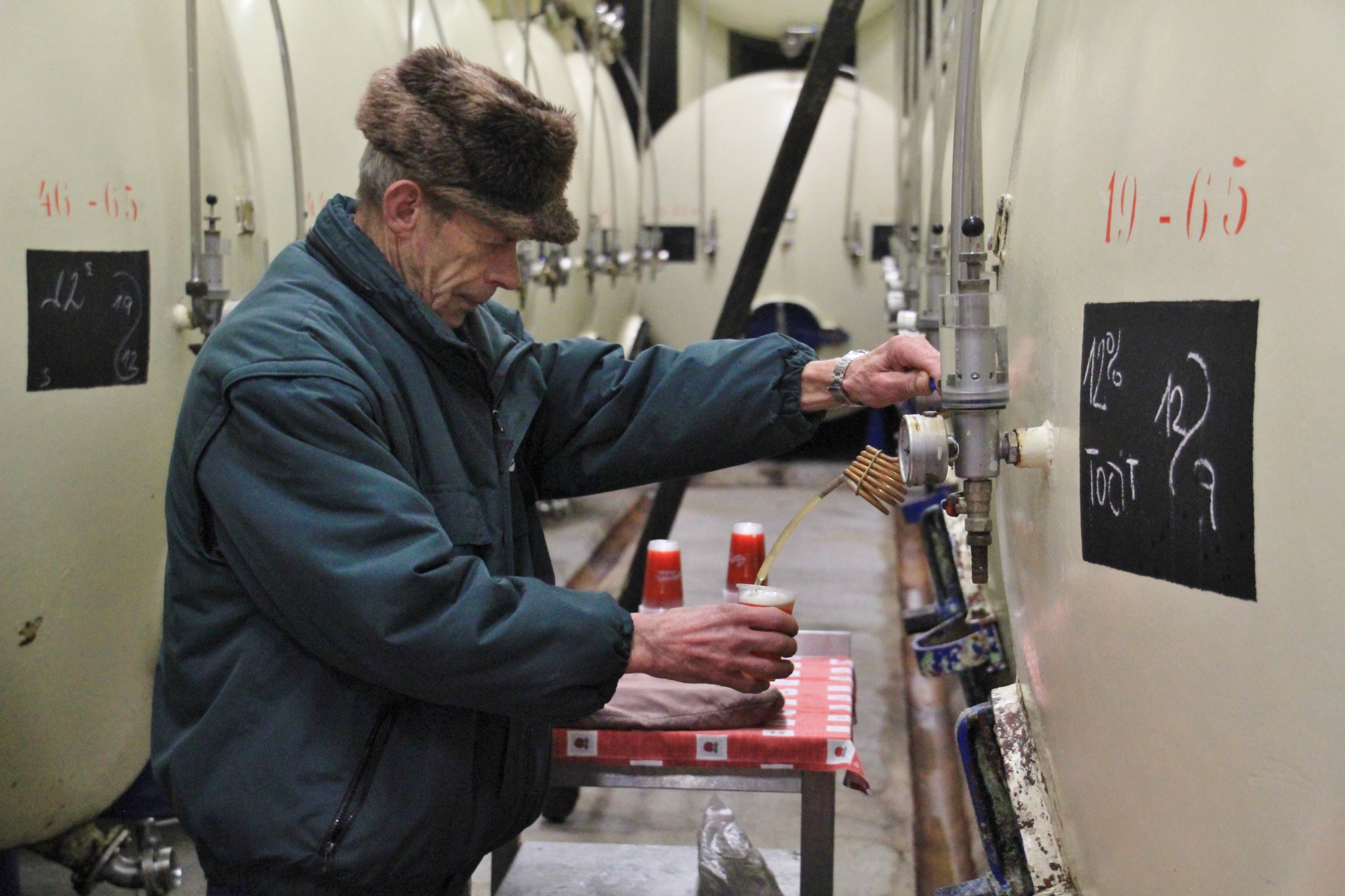 An employee pours a glass of beer at the Budweiser Budvar Brewery in ÄŒeské BudÄ›jovice, Czech Republic.