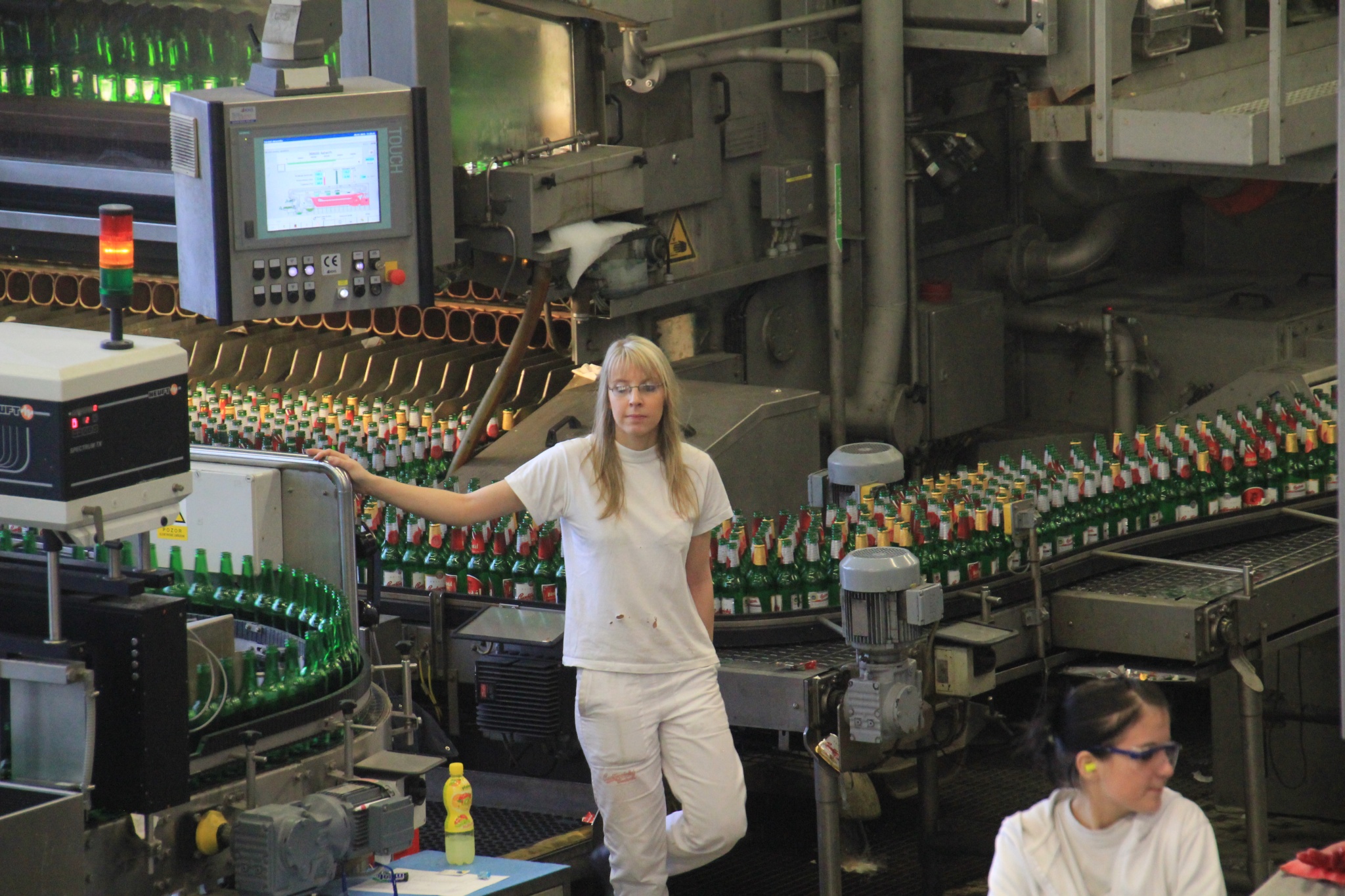 Women work Budweiser Budvar brewery in ÄŒeské BudÄ›jovice, Czech Republic.