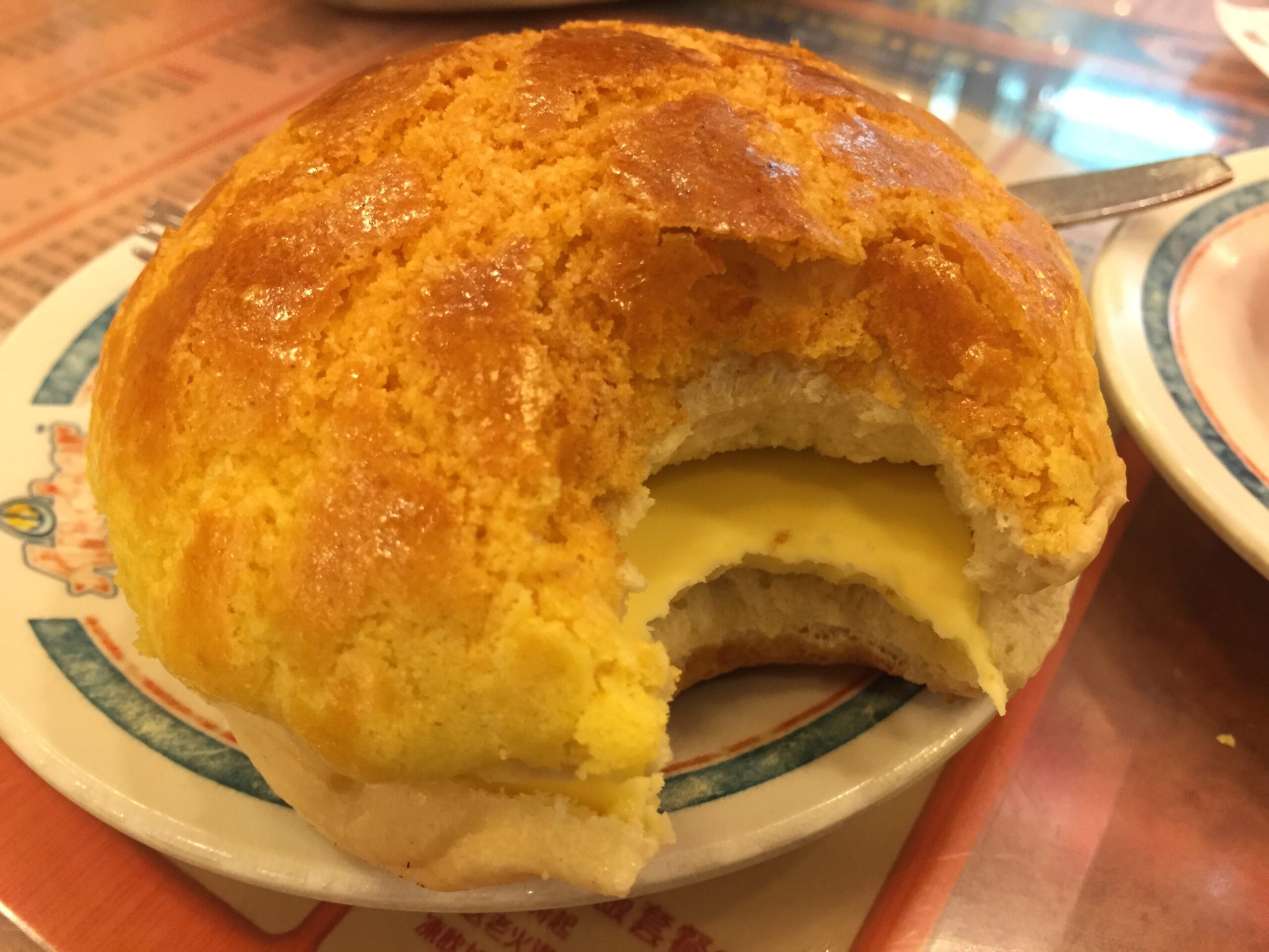 Kam Wah, a traditional Hong Kong cafe, serves an excellent traditional pineapple bun with butter.