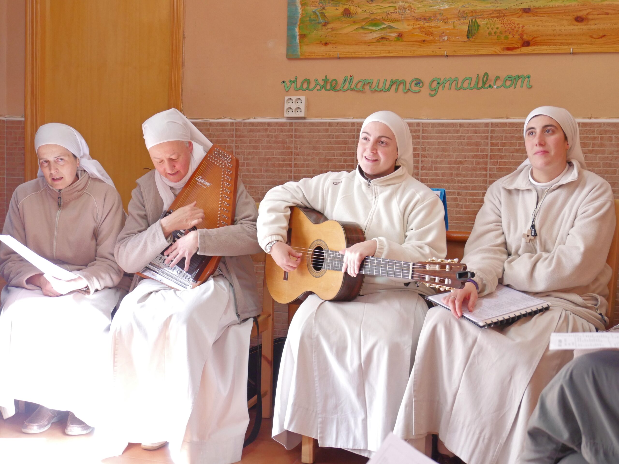 Four nuns sing in the entrance hall of the albergue in Carrión de los Condes, Spain.
