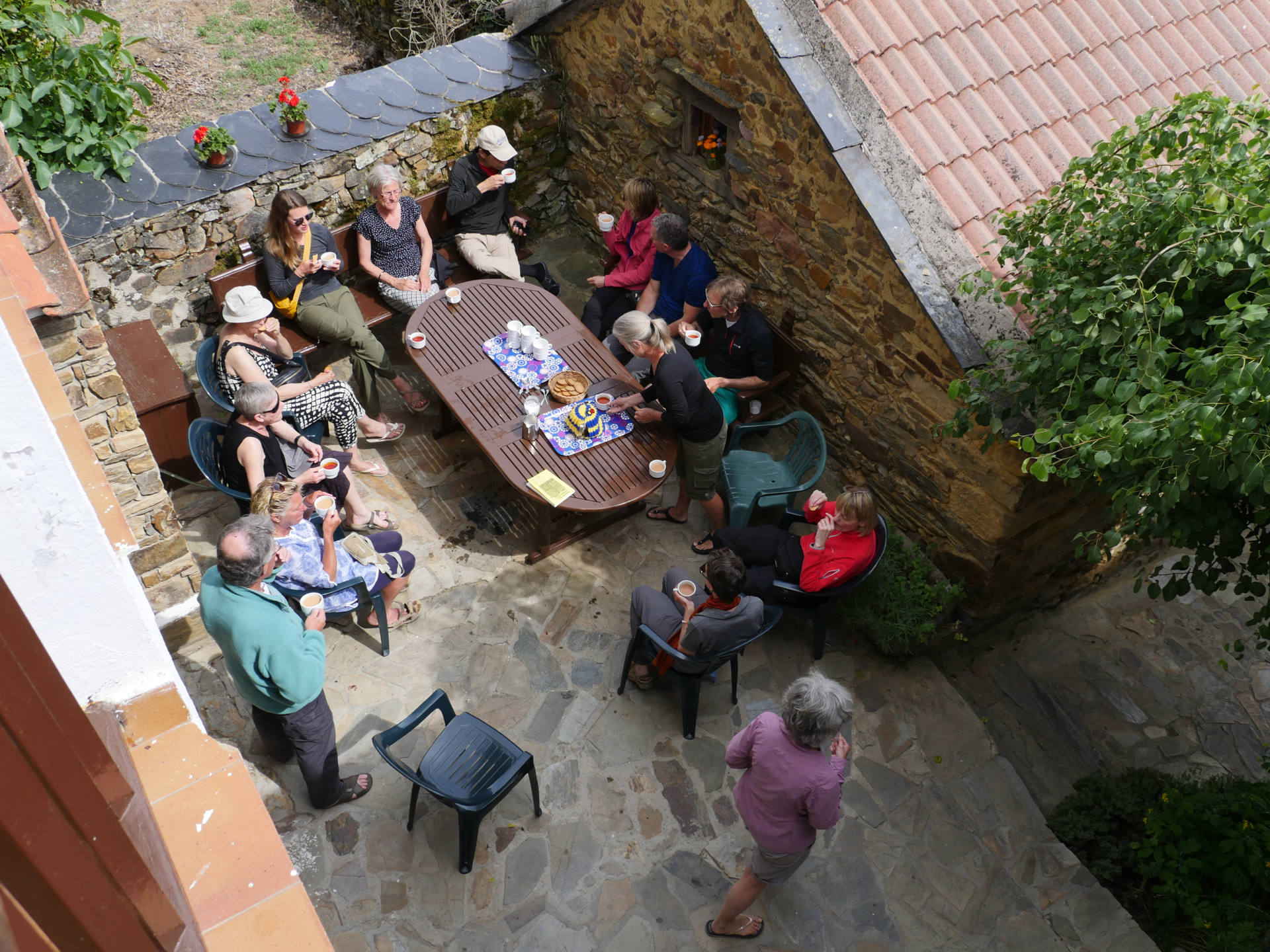 Pilgrims gather for tea in the Guacelmo albergue in Rabanal del Camino, Spain.