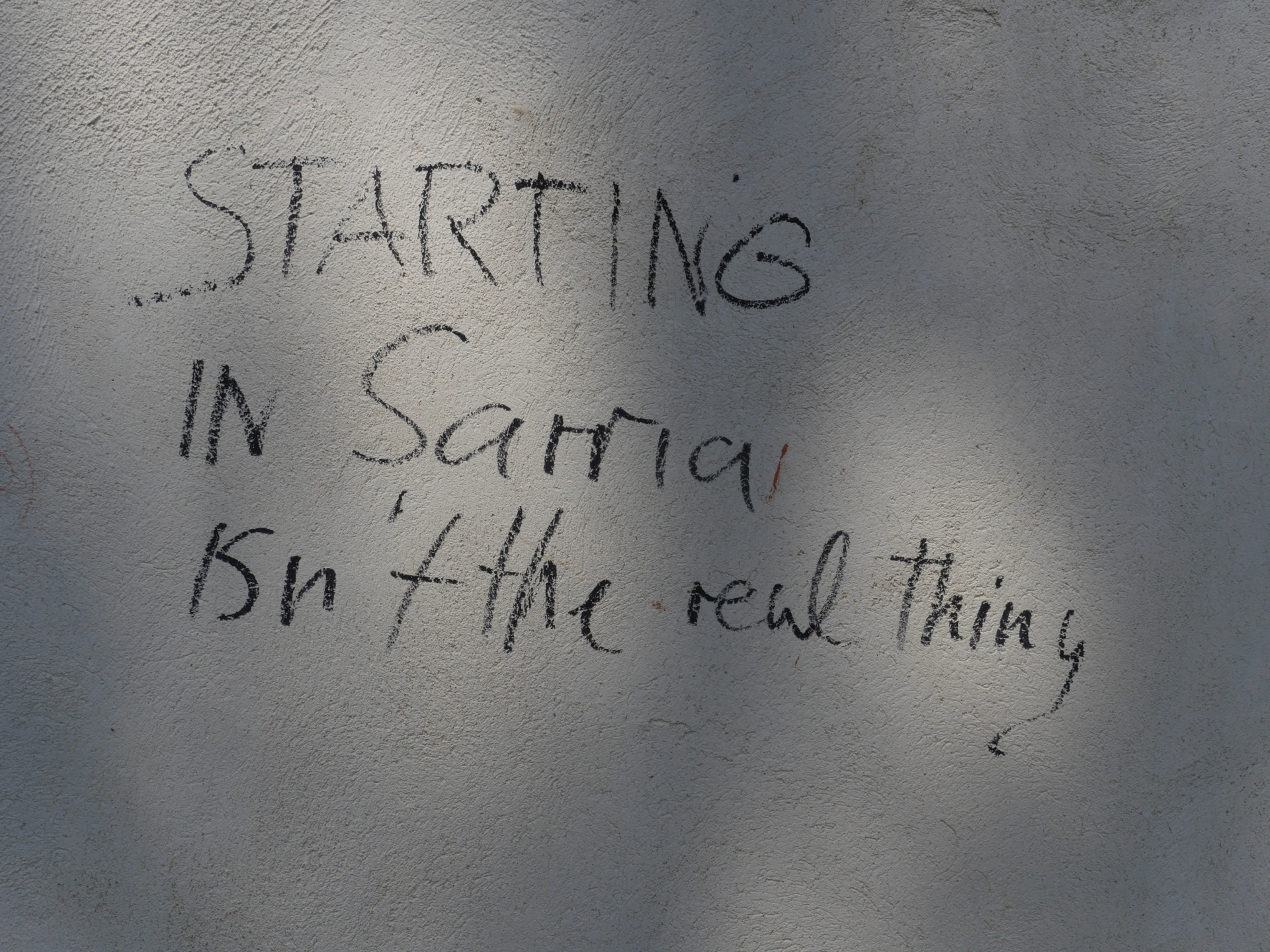 A handwritten sign near Sarria states, 