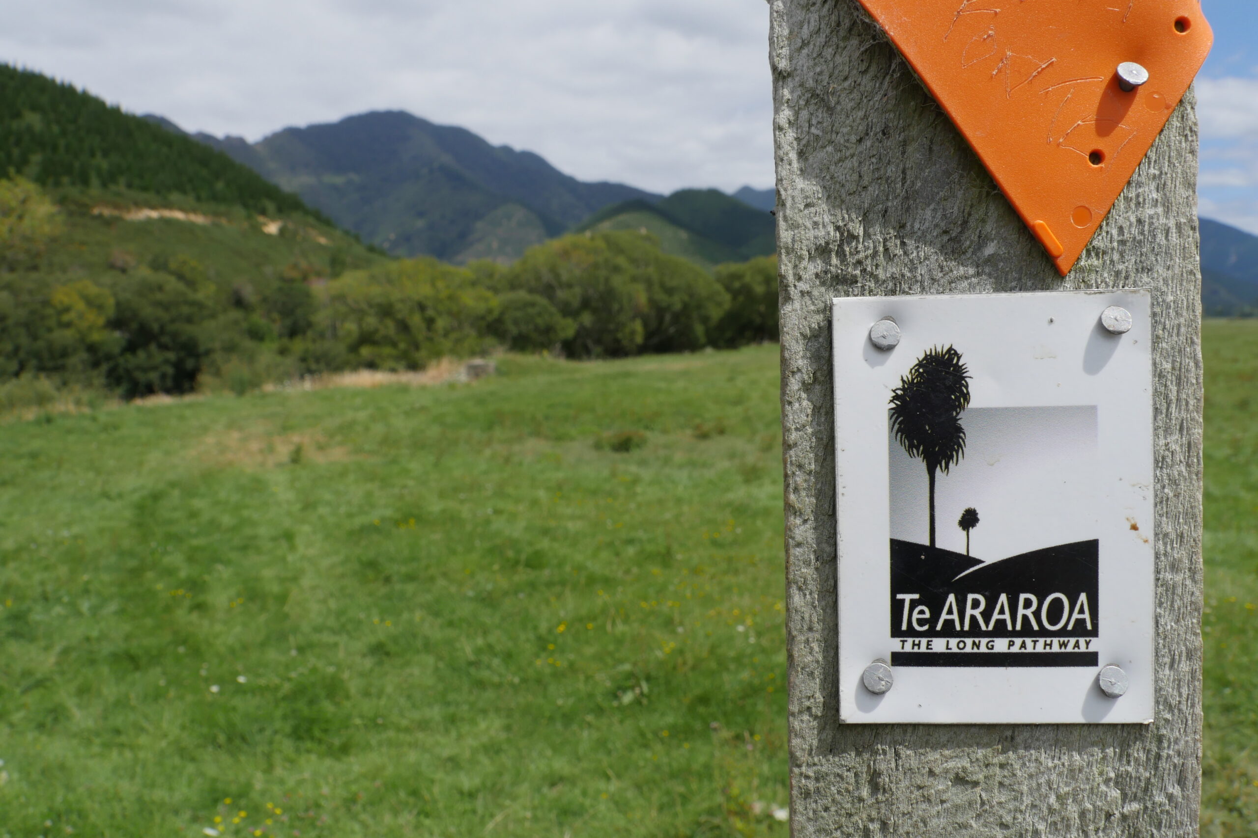 A sign directs Te Araroa hikers near Havelock, New Zealand.