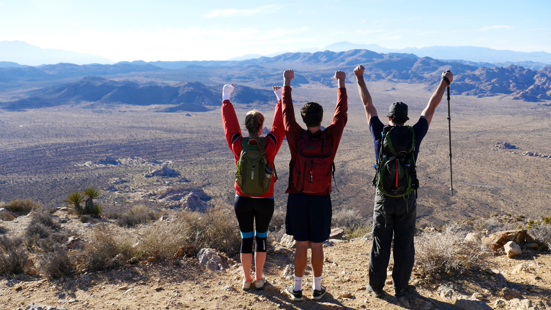 Hikers celebrate atop Ryan Mountain in Joshua Tree National Park.