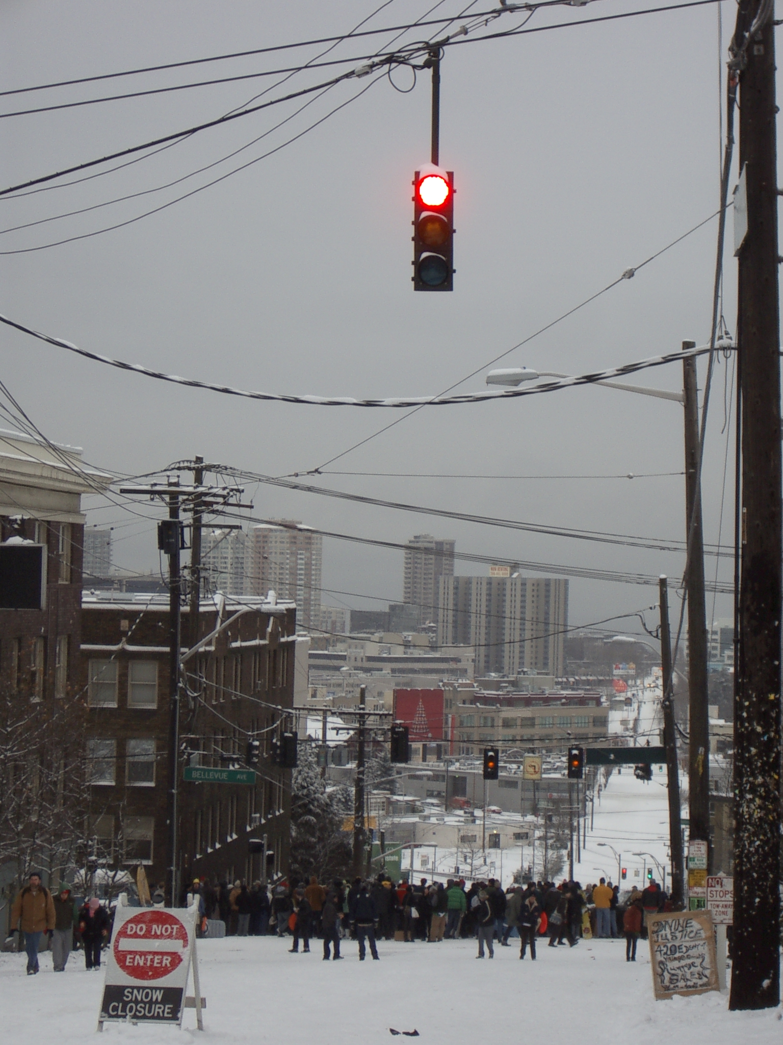 Seattleites commandeer Olive Ave. for use as a huge sledding hill.