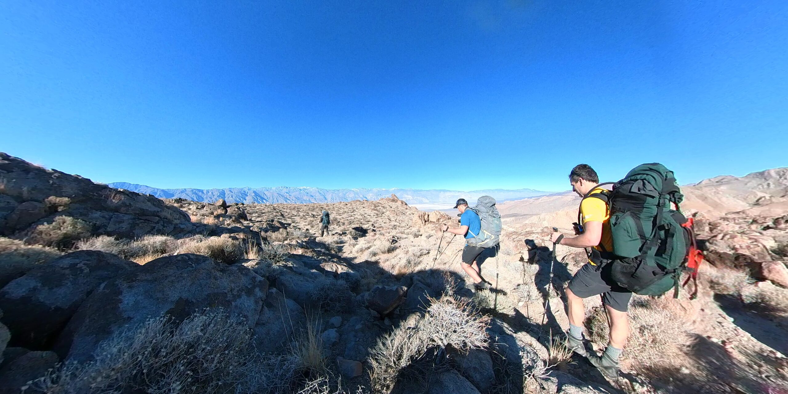 Hikers moving cross-country in Ubehebe Country