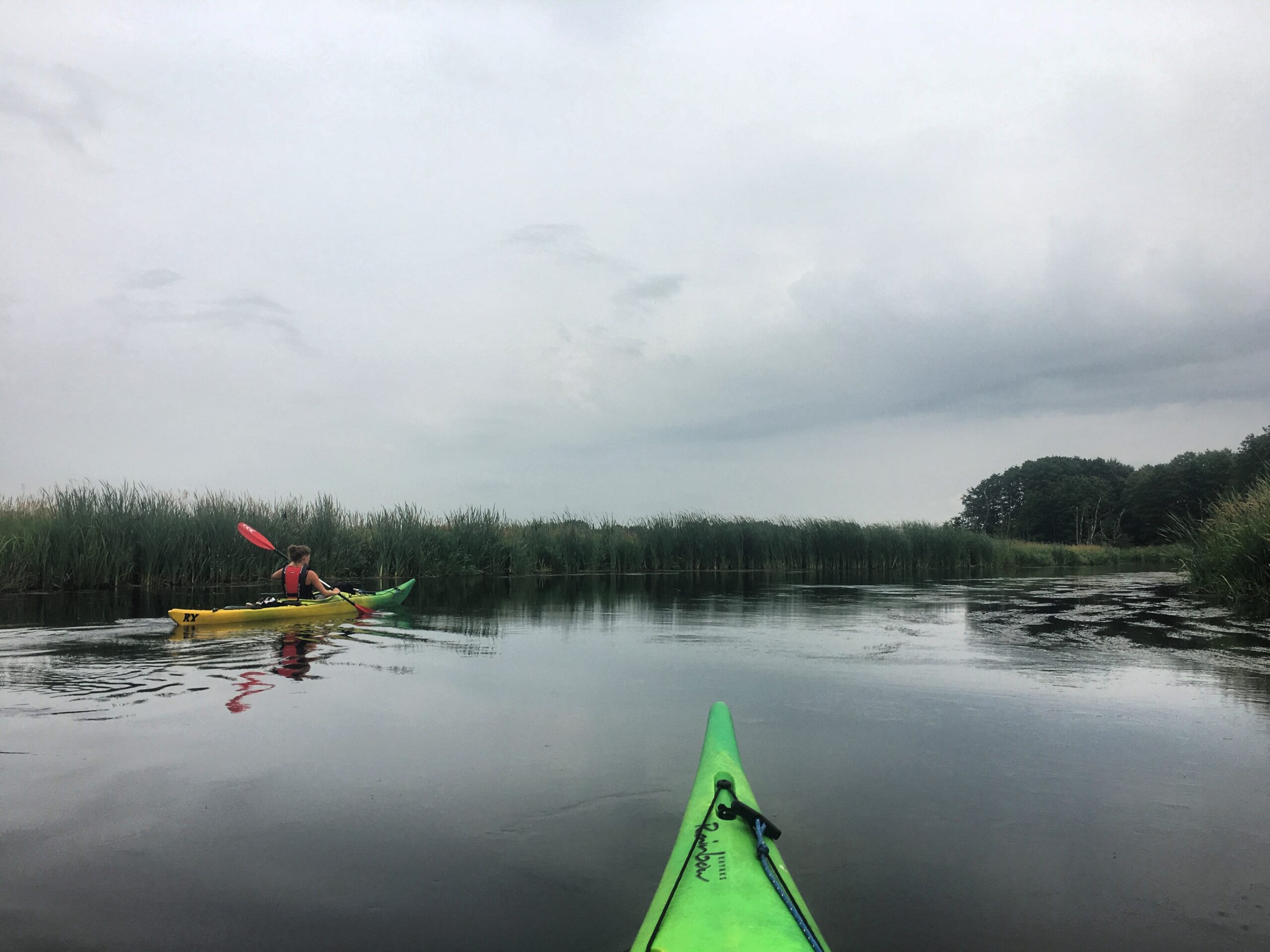 A kayaker paddles the River Guden