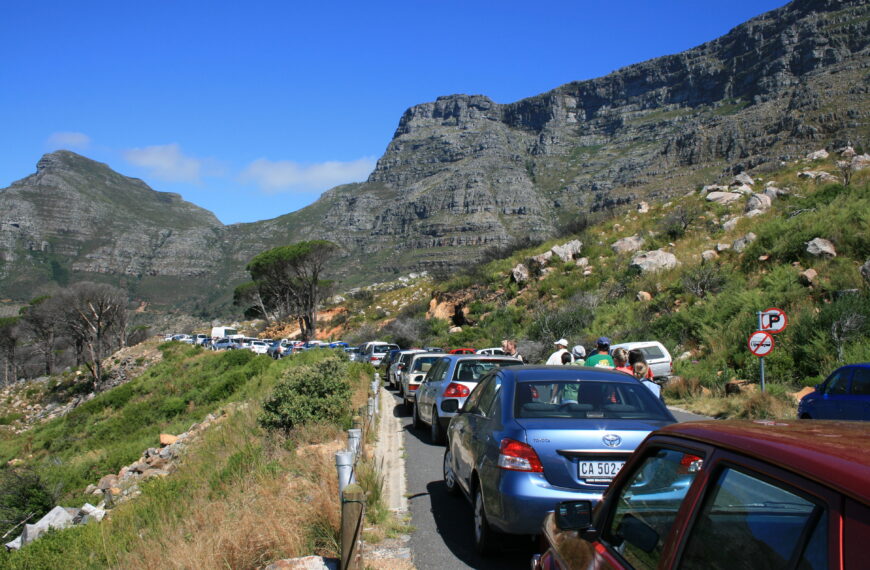 Vacationers wait in traffic near Table Mountain in Cape Town, South Africa.