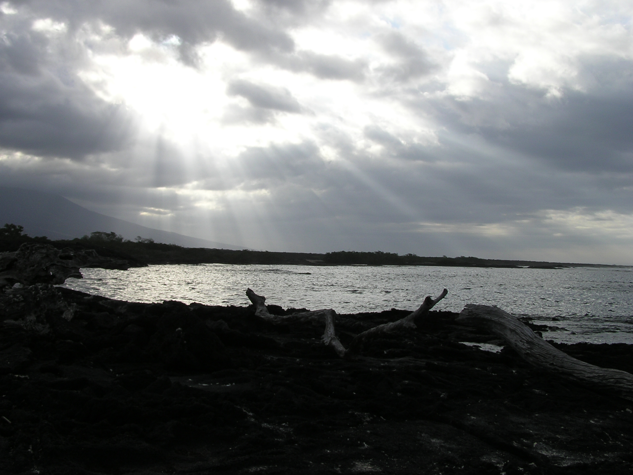 Clouds and sun on Fernandina Island 2