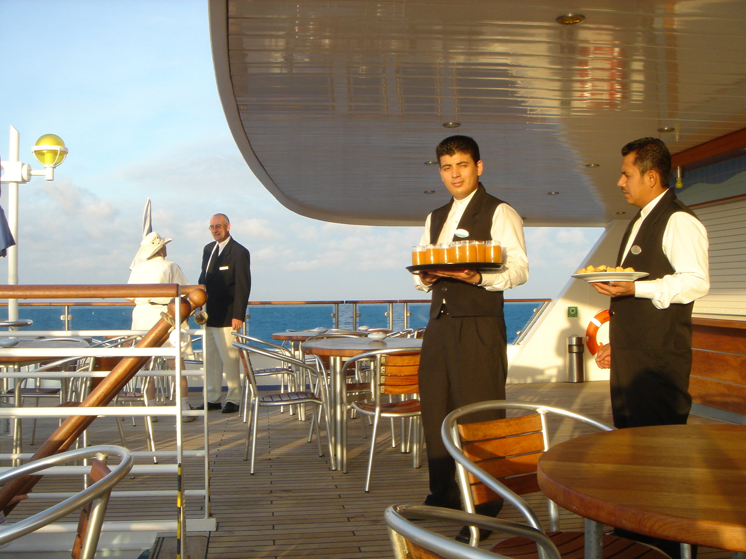 Ship waiters with drinks and food