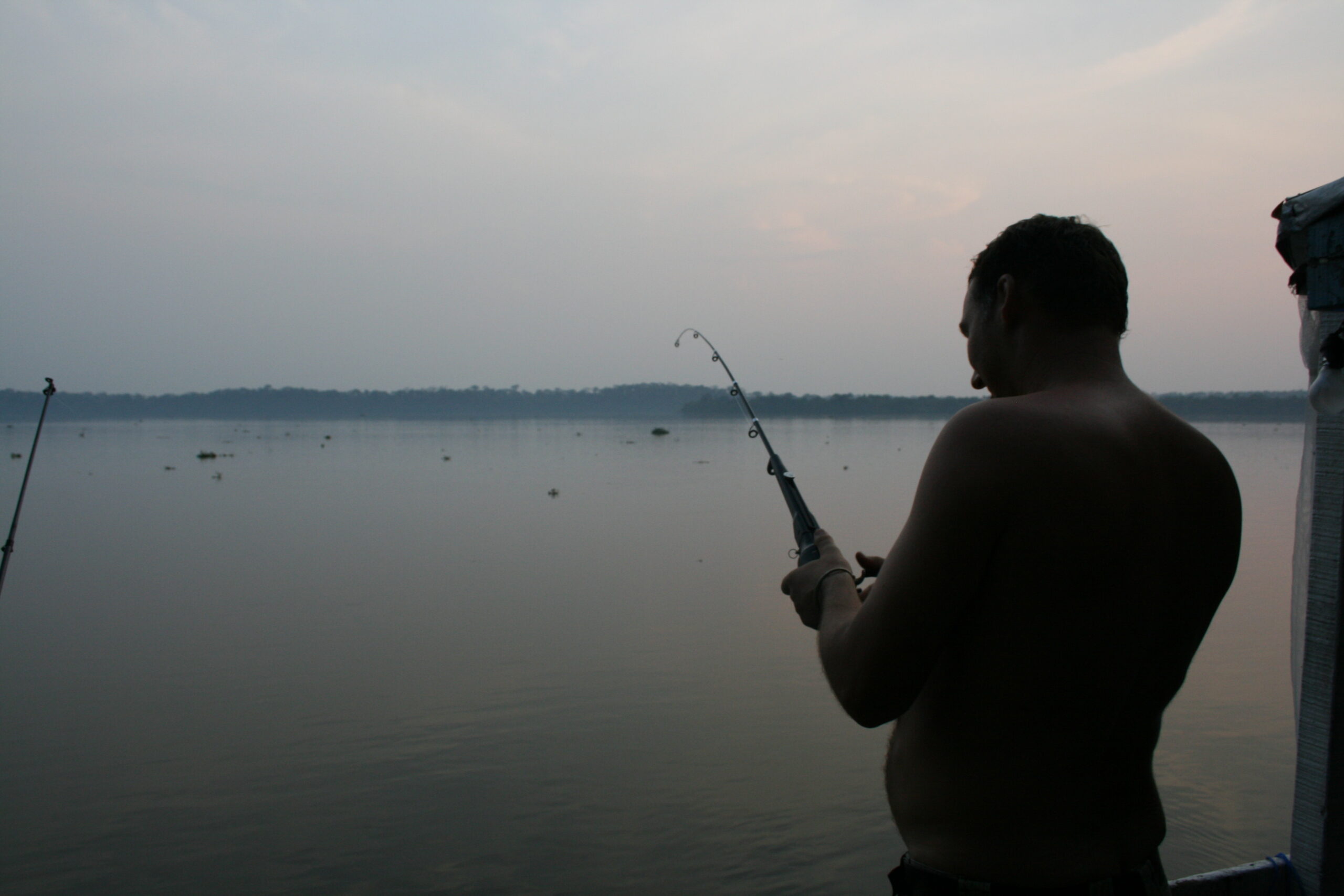 Man fishing near Basoko