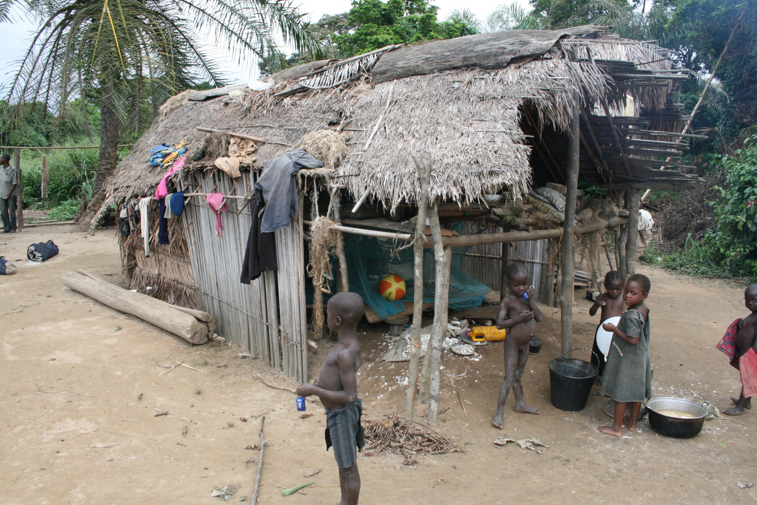 Bomongo village children with hut