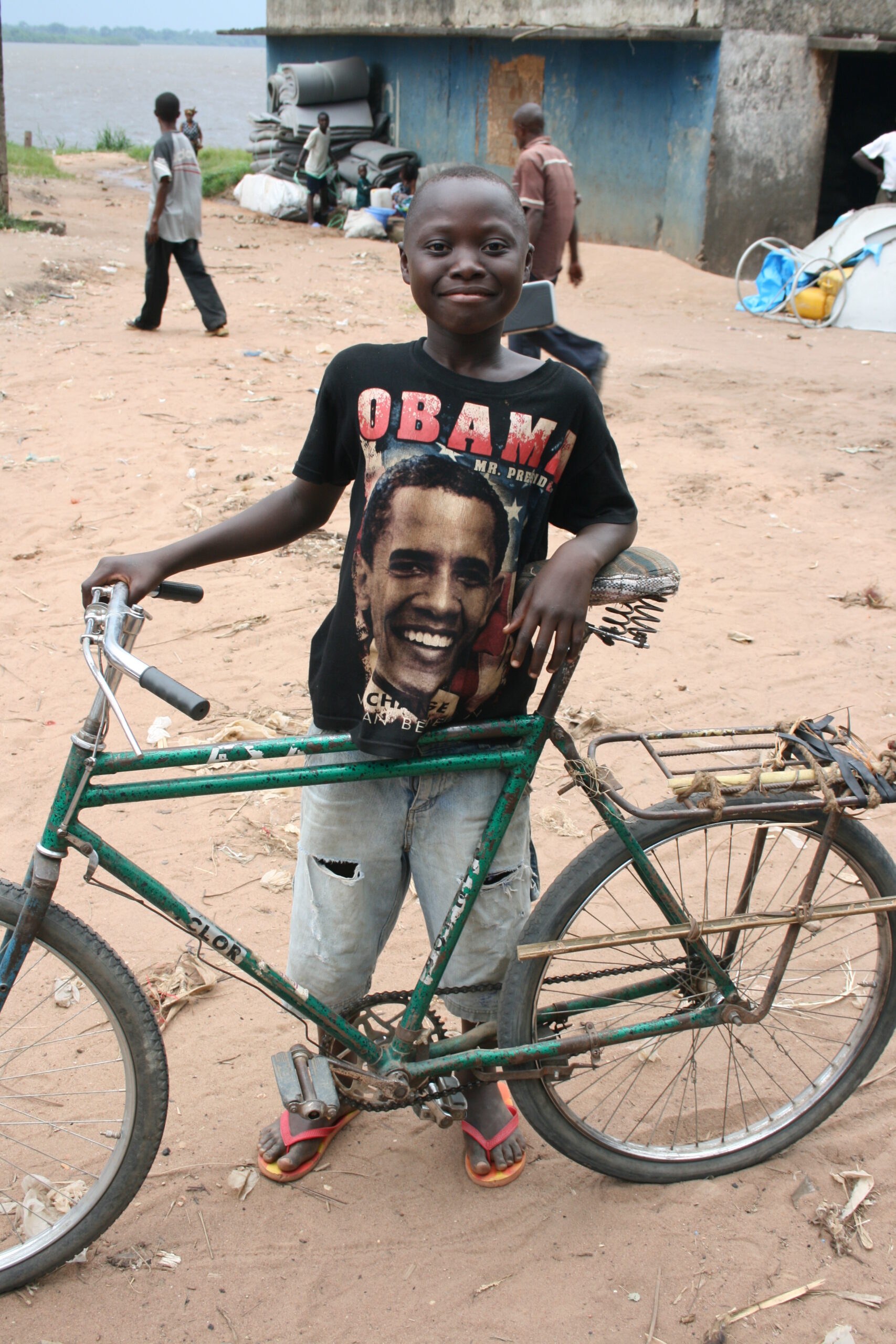 Child with Obama shirt and bicycle in Lisala
