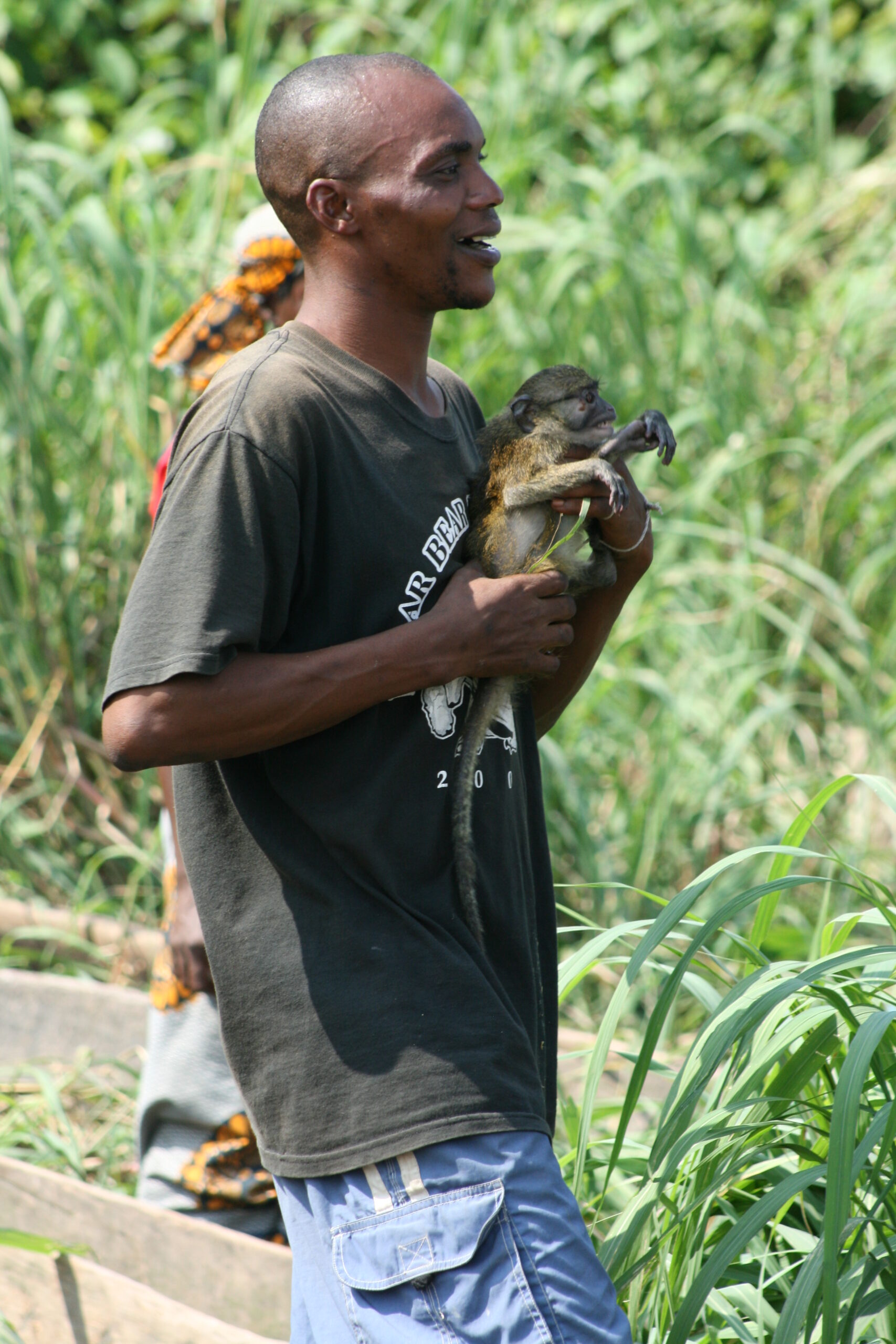 Man with monkey at Mokonzi market