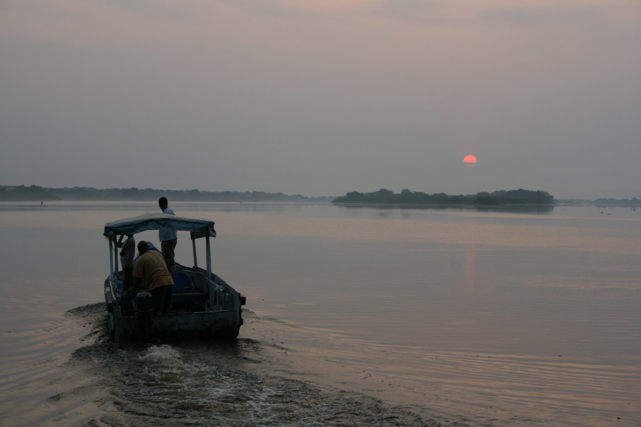 Fishing boat at sunrise
